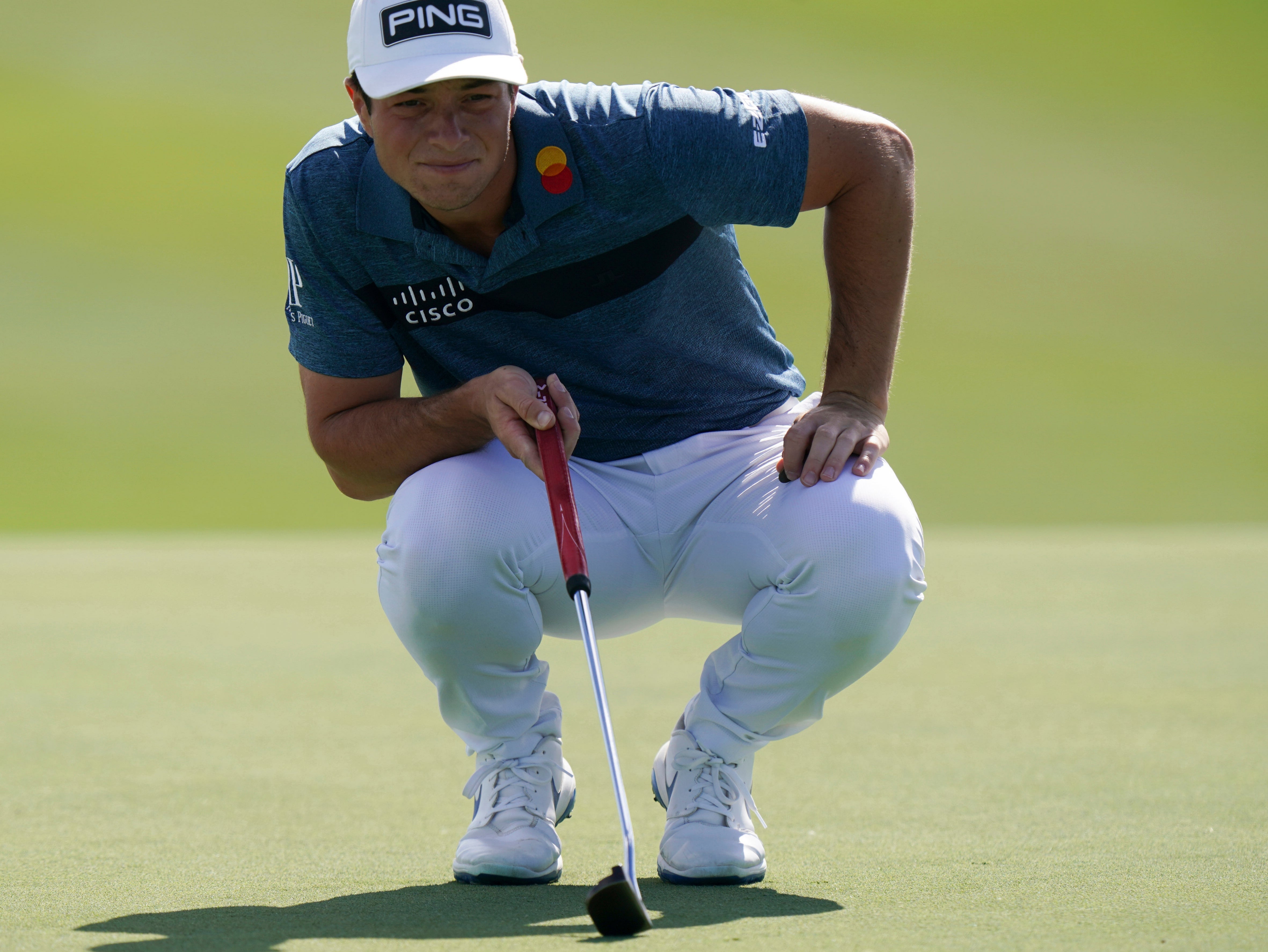 Viktor Hovland carded a closing 66 to win the Hero World Challenge in the Bahamas (Fernando Llano/AP)