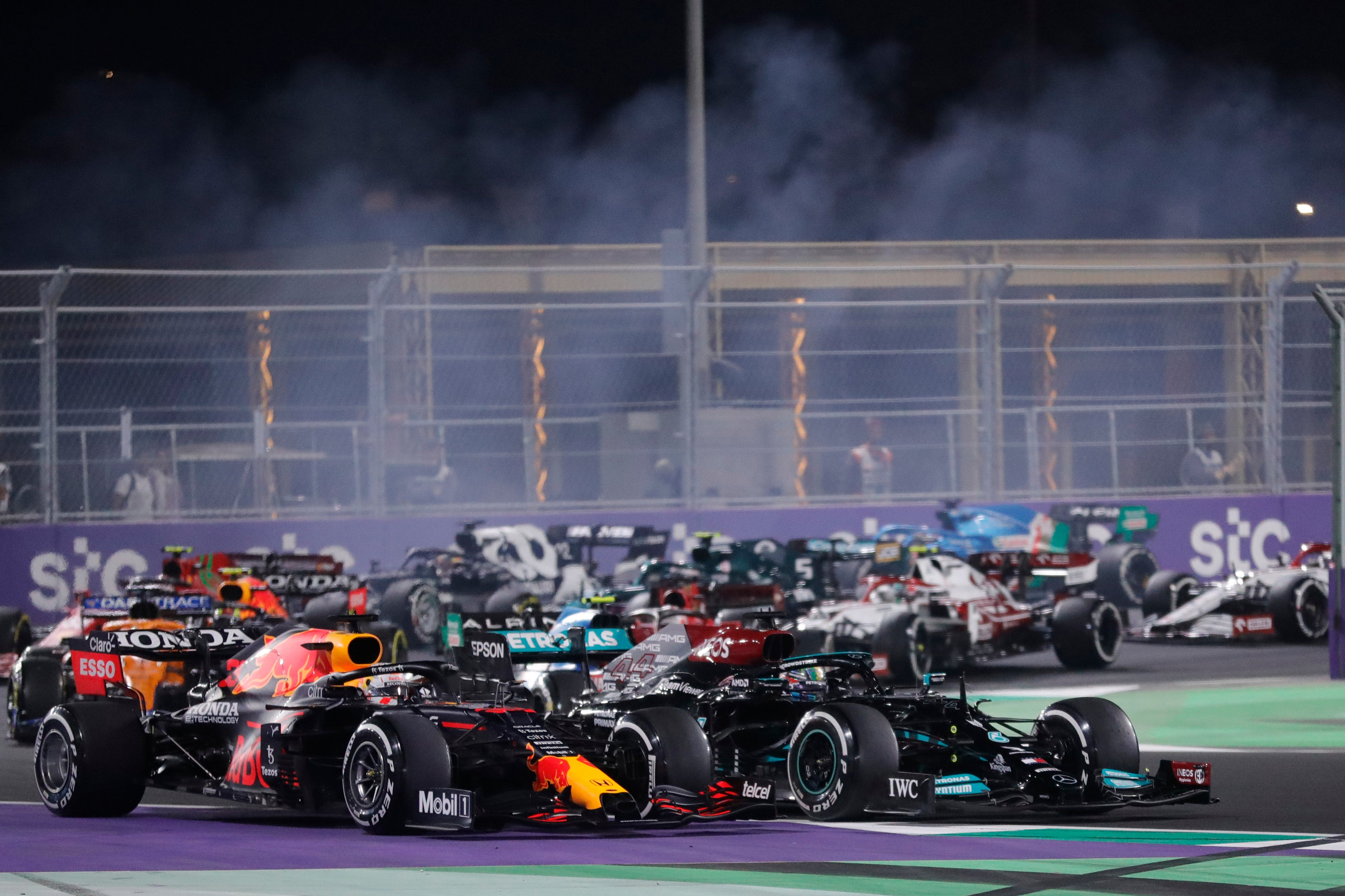 Max Verstappen, left, and Lewis Hamilton in action (Amr Nabil/AP)