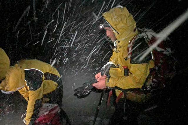 Mountain rescuers (Handout/PA)