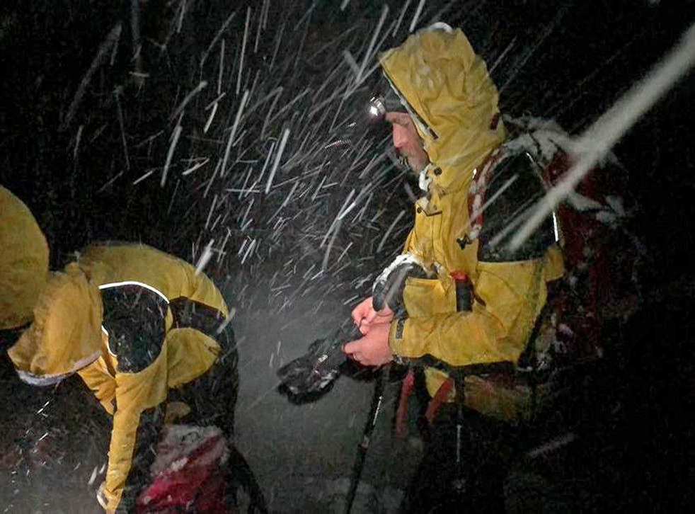 Mountain rescuers (Handout/PA)