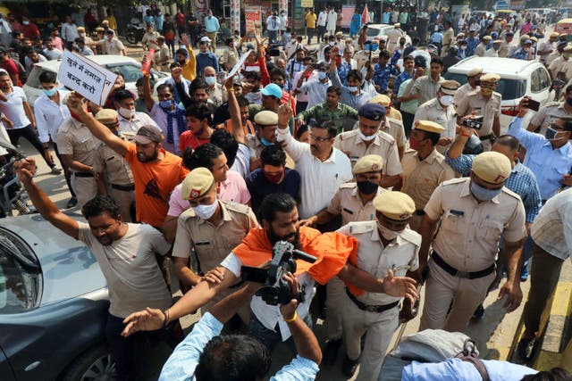 <p>Police stand guard to secure the site of Friday prayers amid protests by Hindu right-wing  groups in Gurugram in October</p>