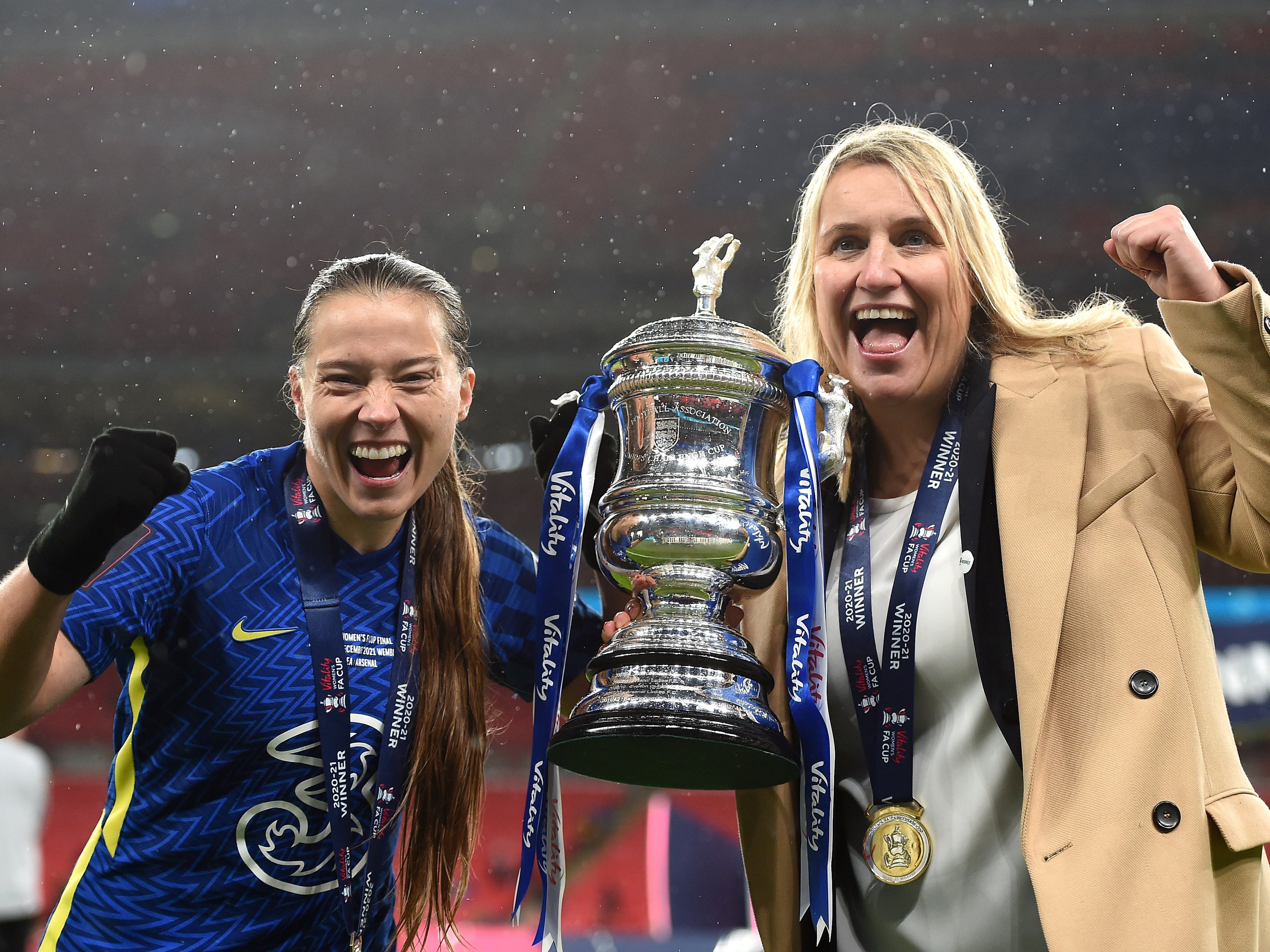 Kirby and Hayes celebrate with the FA Cup