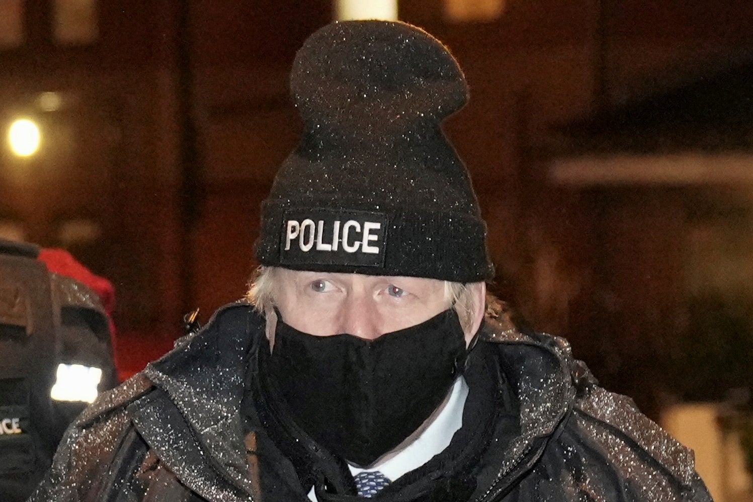 Boris Johnson observes an early morning Merseyside police raid on a home in Liverpool