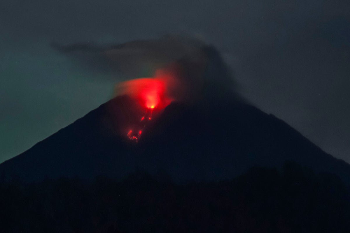 Indonesia volcano erupts again as death toll rises to 22