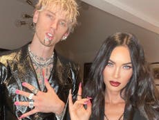 Machine Gun Kelly and Megan Fox link pinky fingers with chain for nail polish launch party