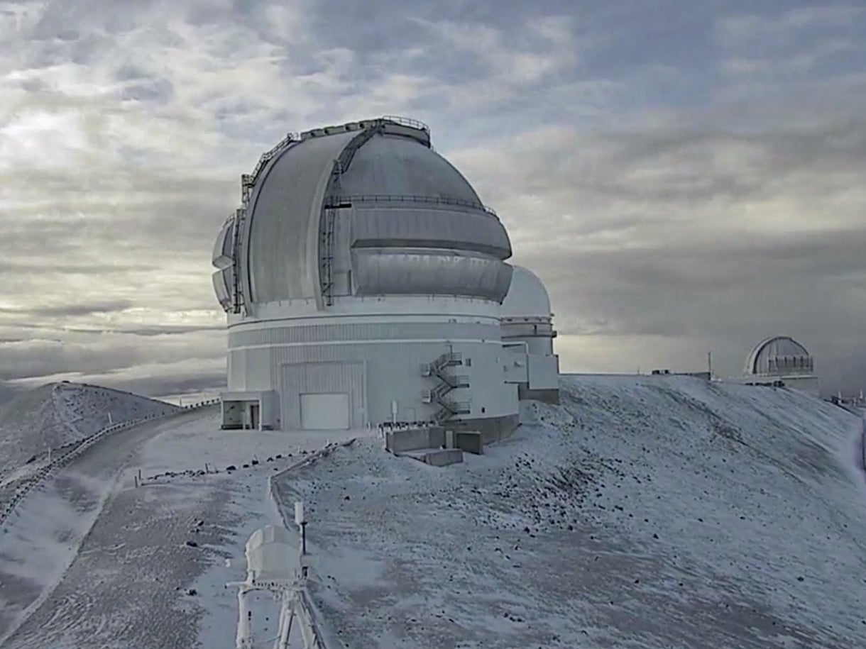 <p>The Mauna Kea summit in Hawaii last week, covered in snow. Blizzard warnings have been issued for the island state</p>