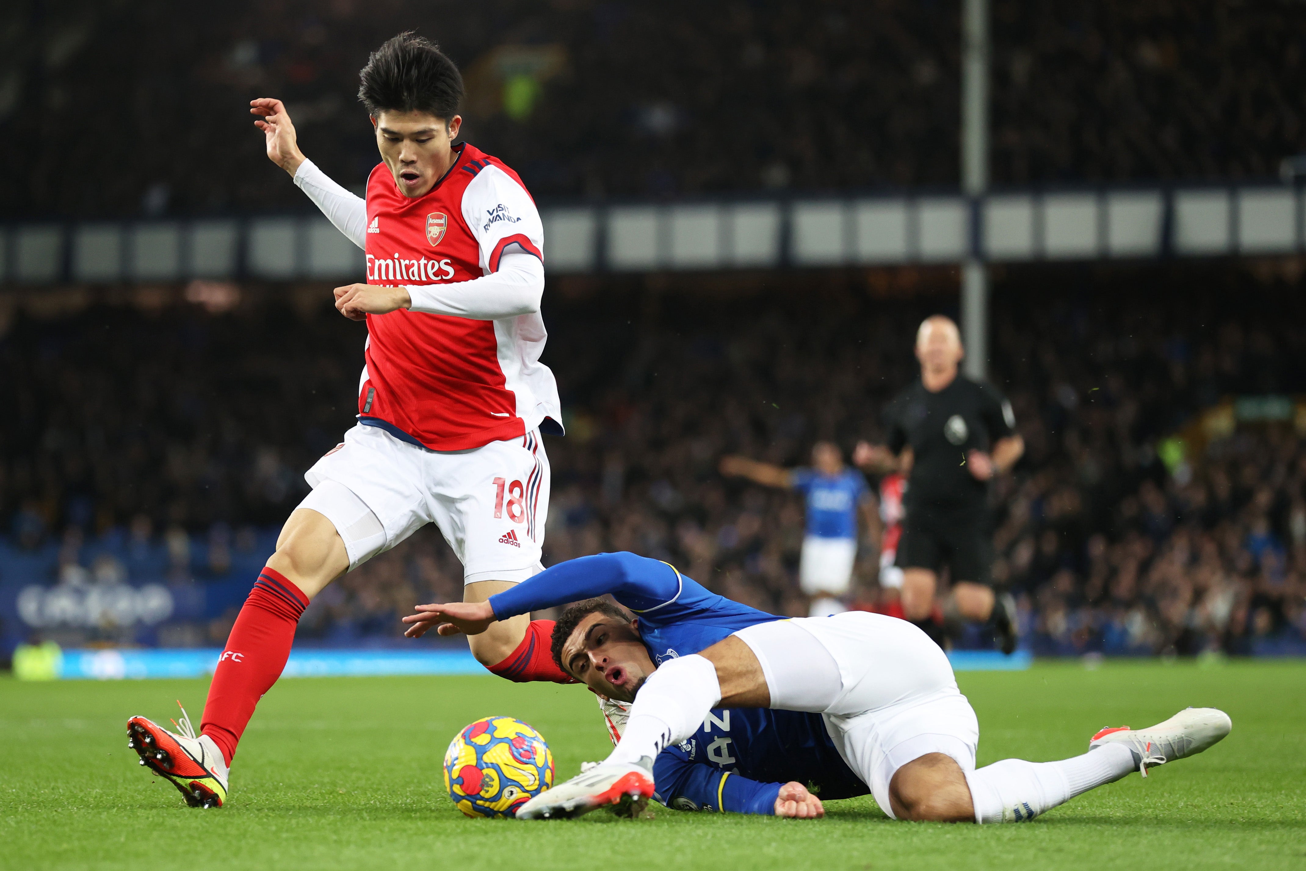 Tomiyasu and Godfrey battled for the ball throughout the match