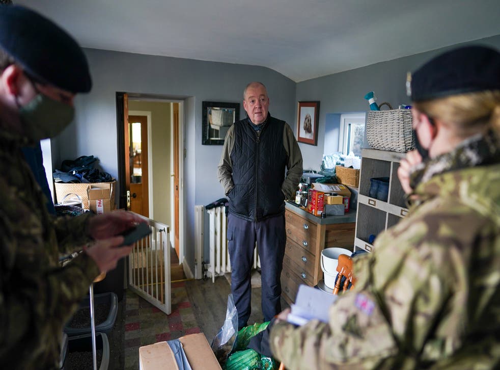<p>Soldiers carry out welfare checks at a remote property that remains without power in County Durham</p>