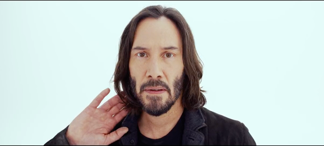 <p>Keanu Reeves in The Matrix Resurrections</p>