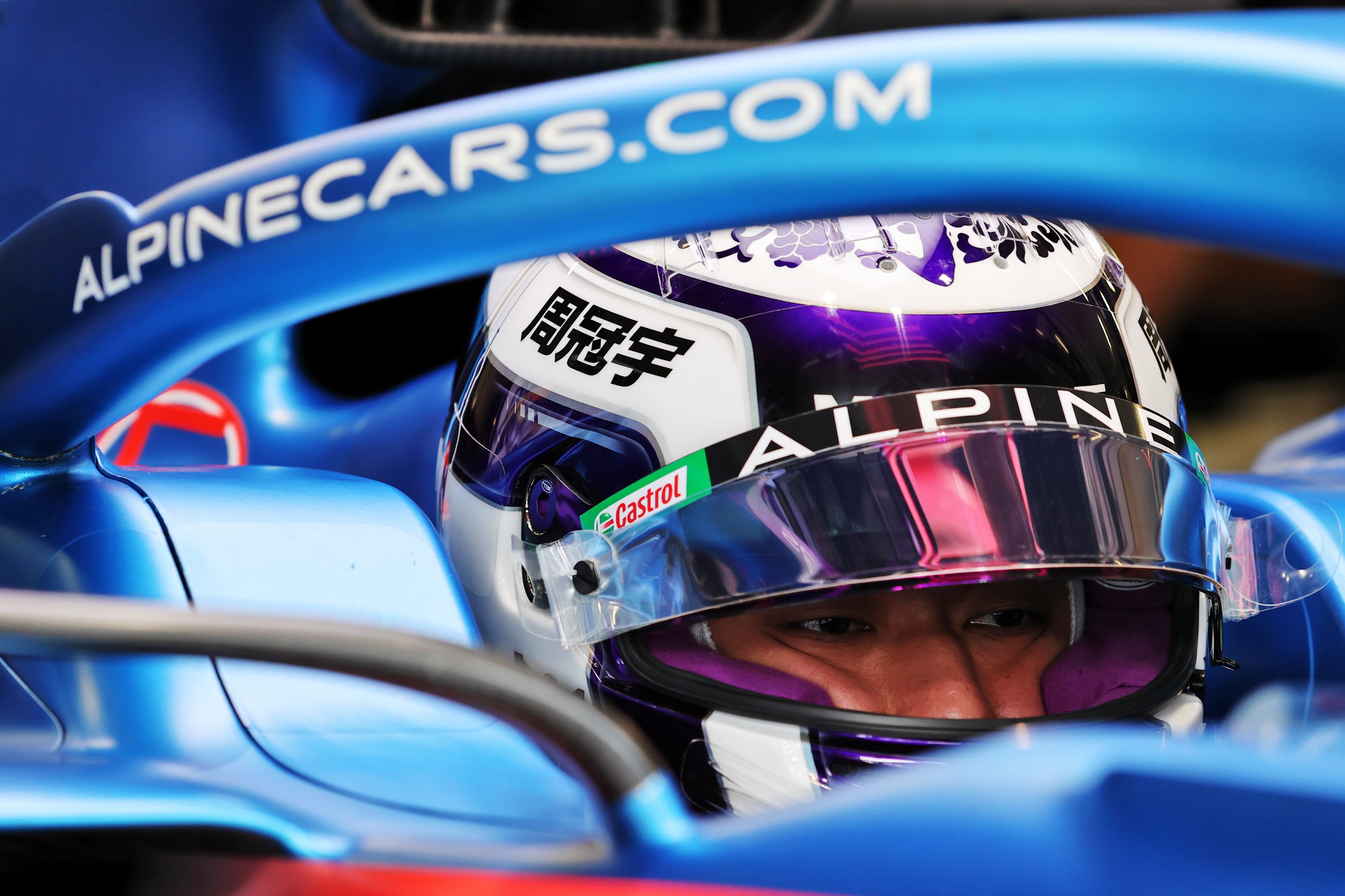 Zhou Guanyu sits behind the wheel of Fernando Alonso’s car during the first free practice session for the Austrian Grand Prix in Spielberg in July