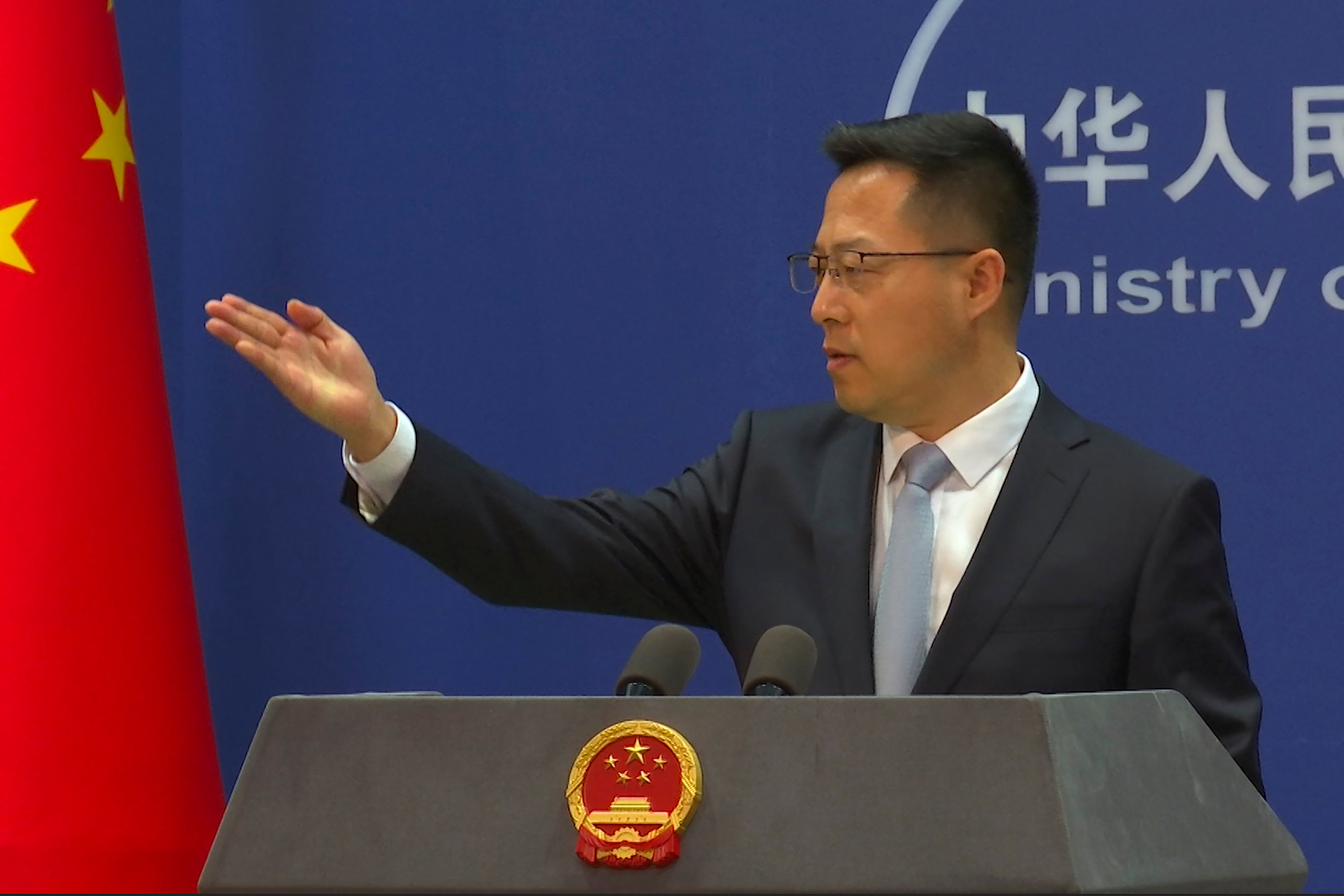 <p>Chinese Foreign Ministry spokesperson Zhao Lijian invites questions during a press conference in Beijing, China on 7 December 2021</p>