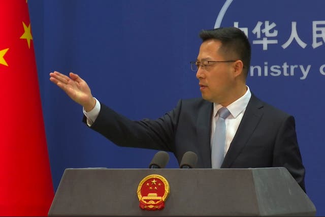 <p>Chinese Foreign Ministry spokesperson Zhao Lijian invites questions during a press conference in Beijing, China on 7 December 2021</p>