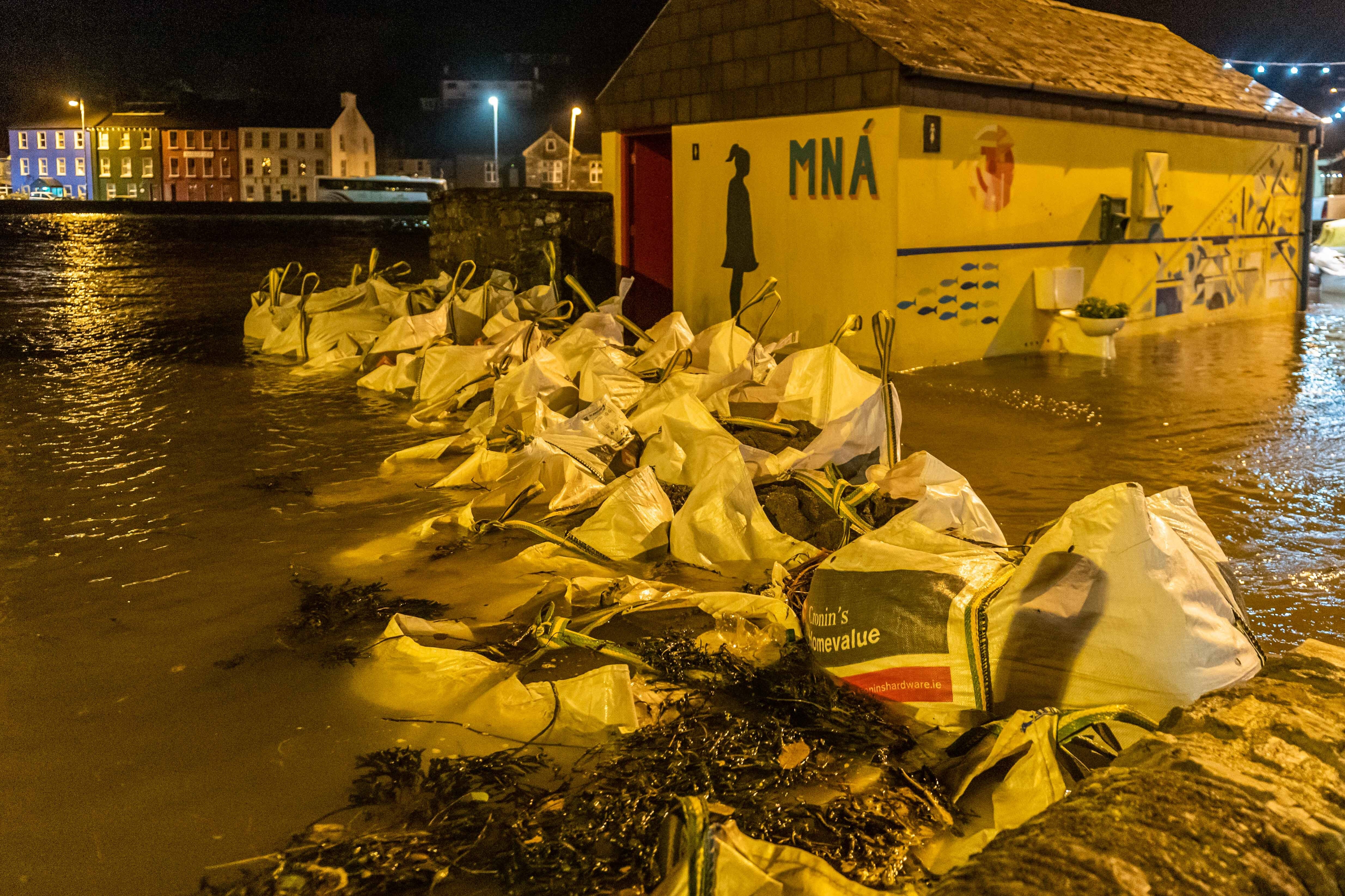Sandbags piled up in the town of Bantry in County Cork which flooded after Storm Barra hit the UK and Ireland with disruptive winds, heavy rain and snow (PA)