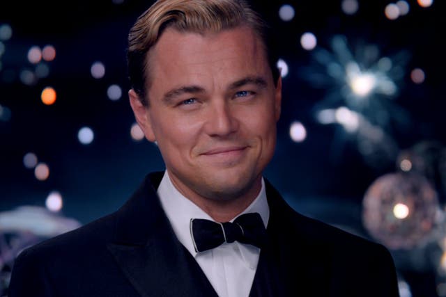 <p>Boats against the current: Leonardo DiCaprio as Jay Gatsby in ‘The Great Gatsby’ </p>