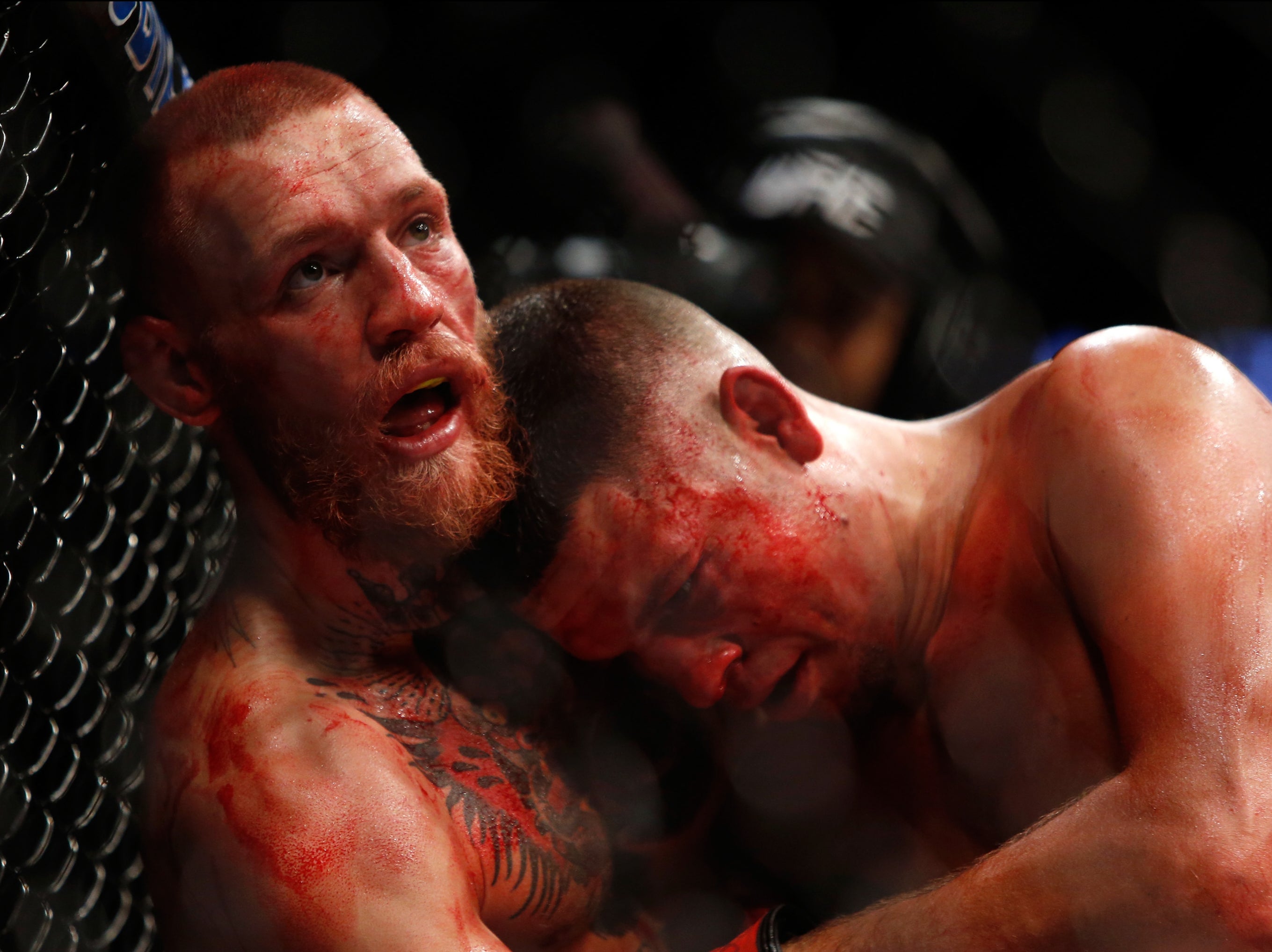 Conor McGregor (left) and Nate Diaz during their rematch in August 2016