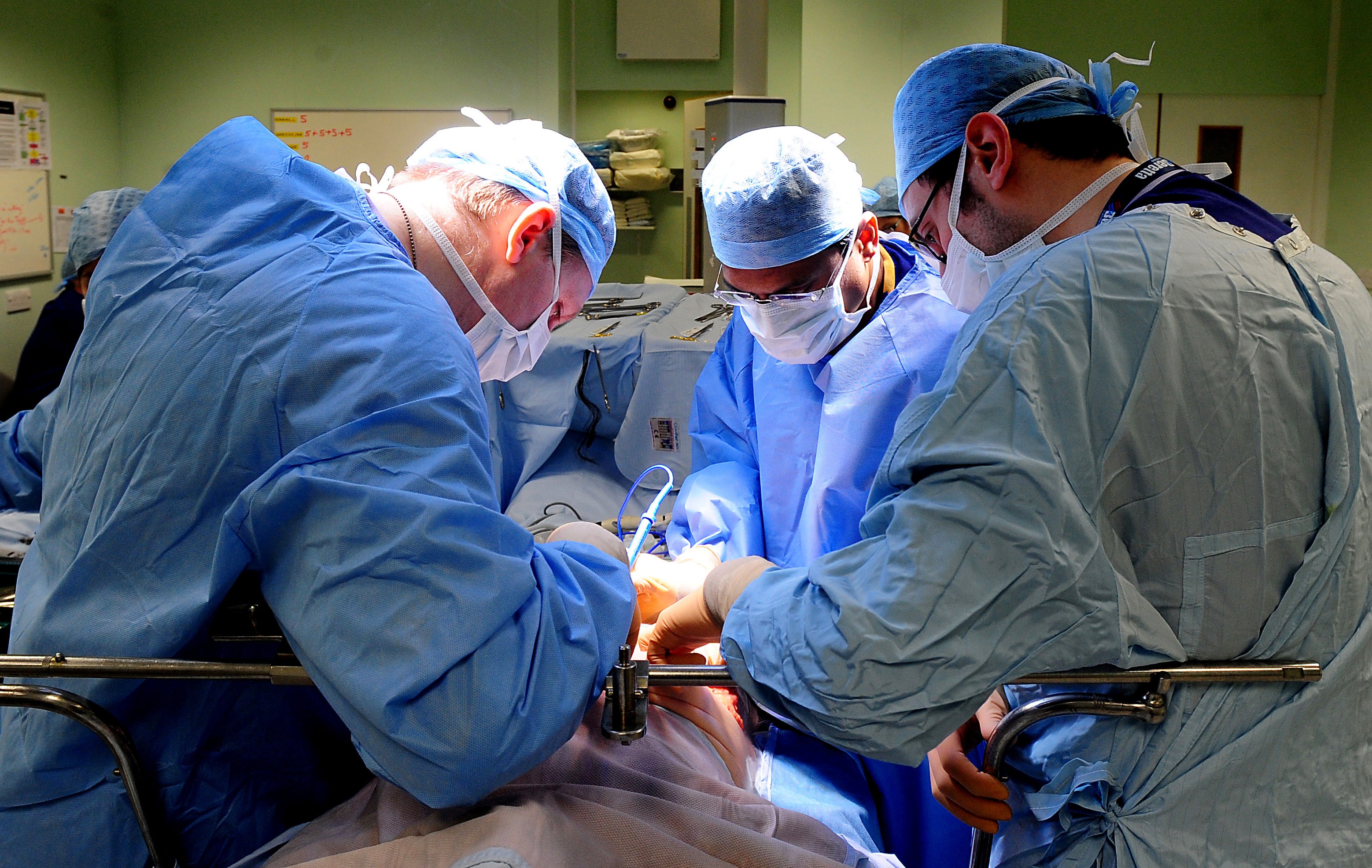 Someone performing an operation (Rui Viera/PA)