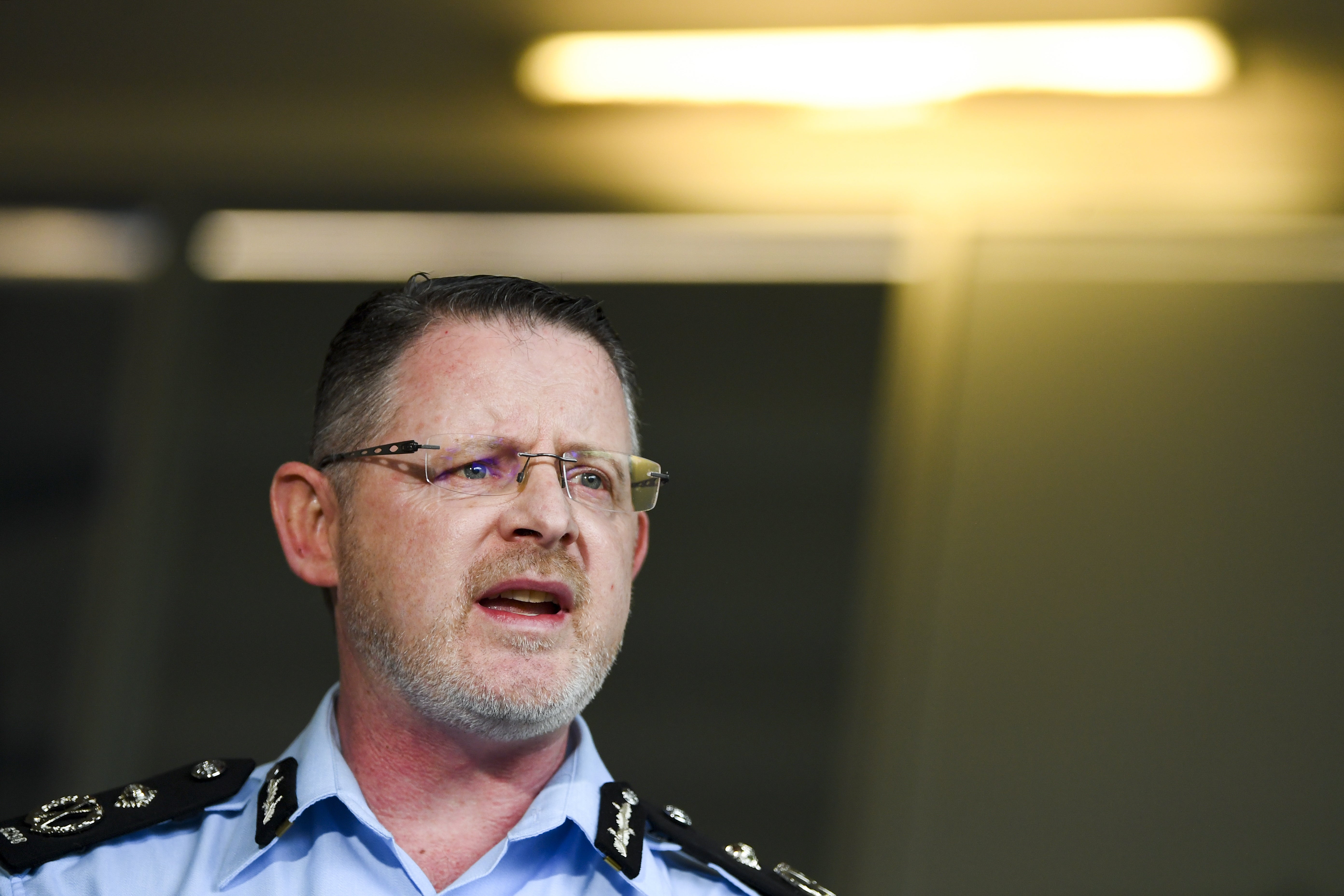 Australian Federal Police Assistant Commissioner Nigel Ryan speaks to the media during a press conference in Canberra, Australia on 7 December 2021