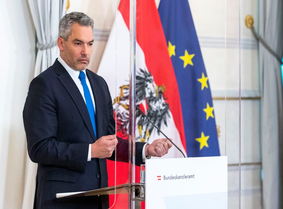 <p>The new Austrian Chancellor Karl Nehammer speaks at a news conference in Vienna</p>
