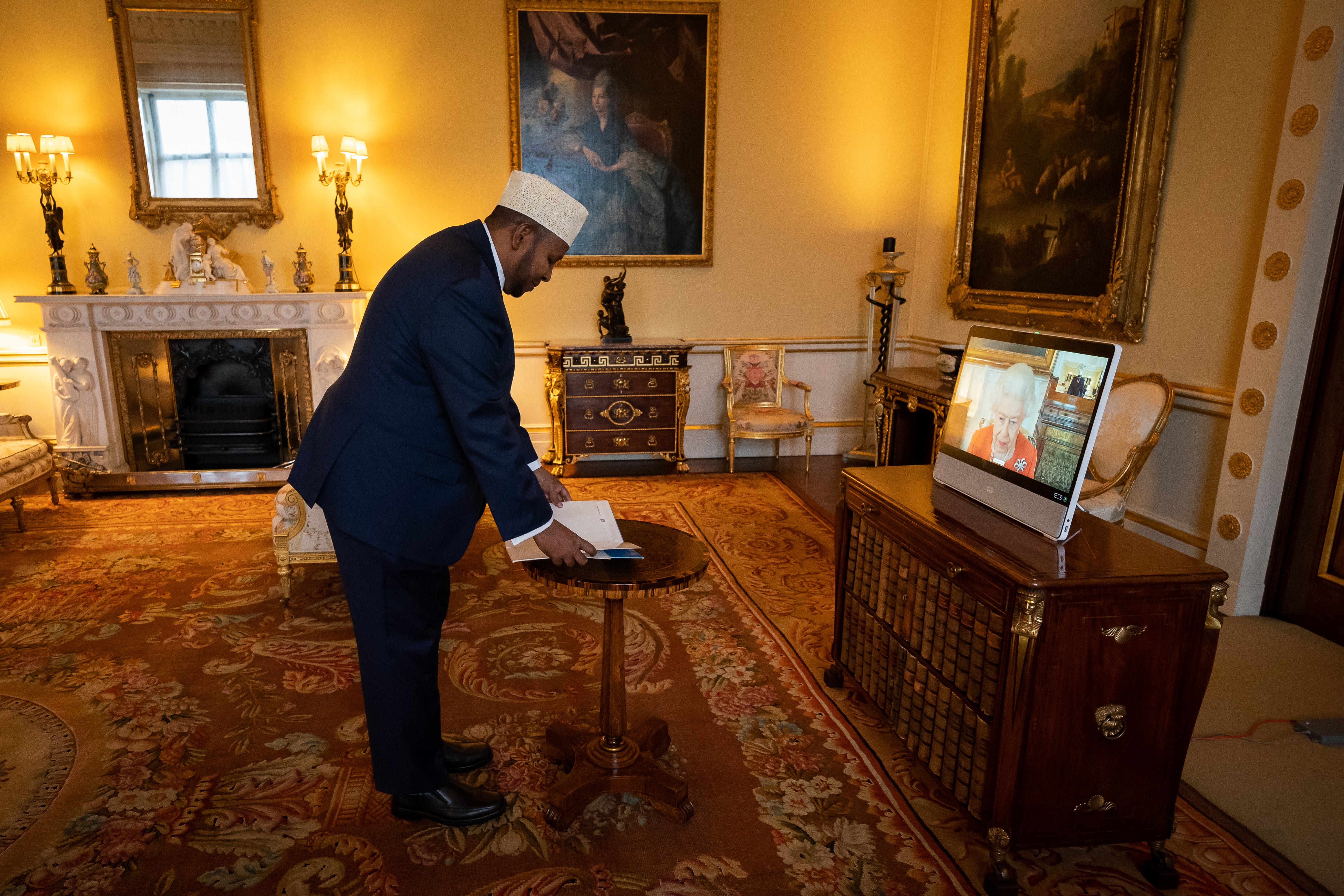 The Queen appears on a screen via video-link from Windsor Castle during a virtual audience with the Ambassador of Somalia, Abdulkadir Ahmed Kheyr Abdi (Aaron Chown/PA)