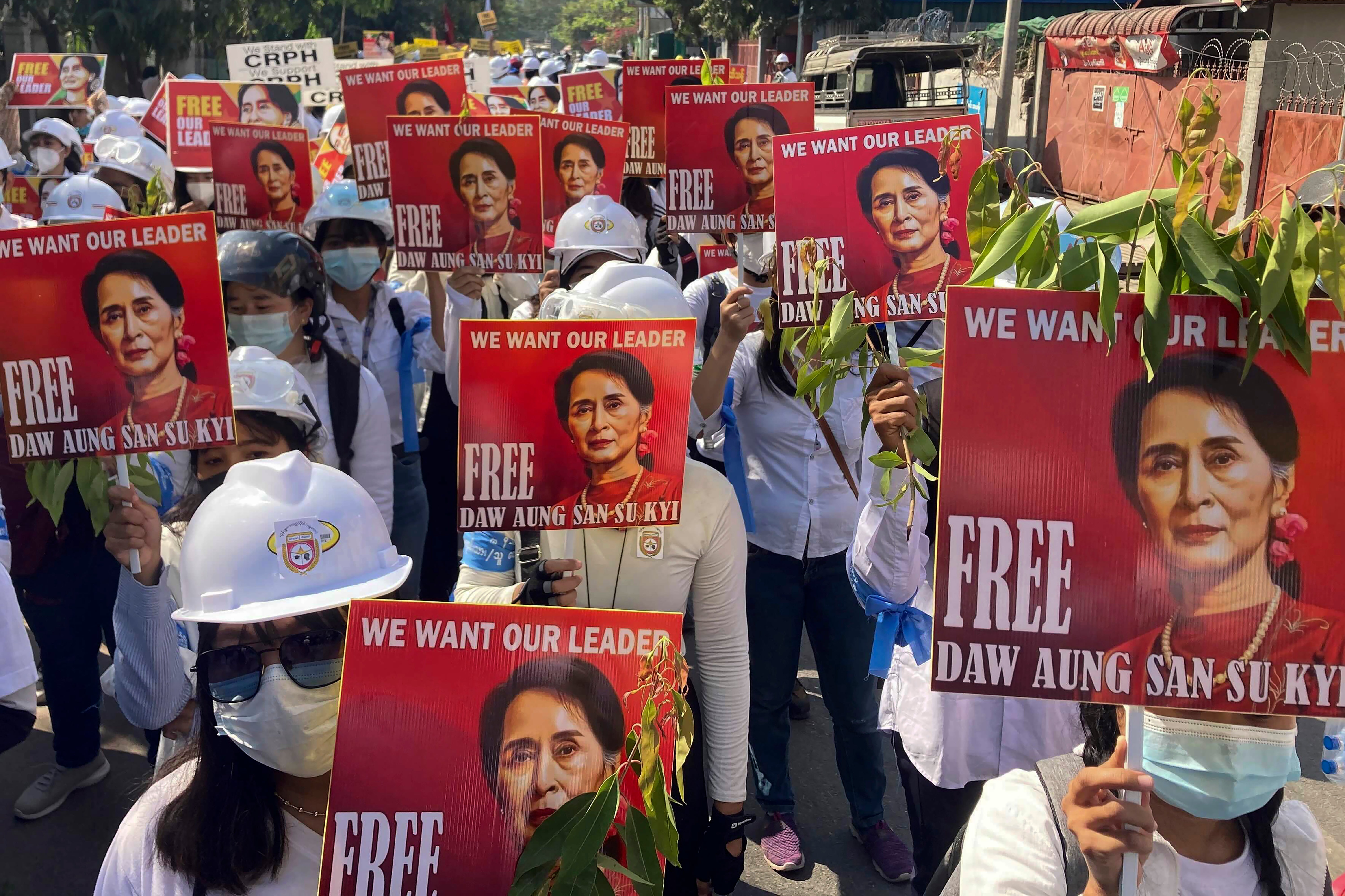 Protesters march at an anti-coup demonstration in Mandalay in March