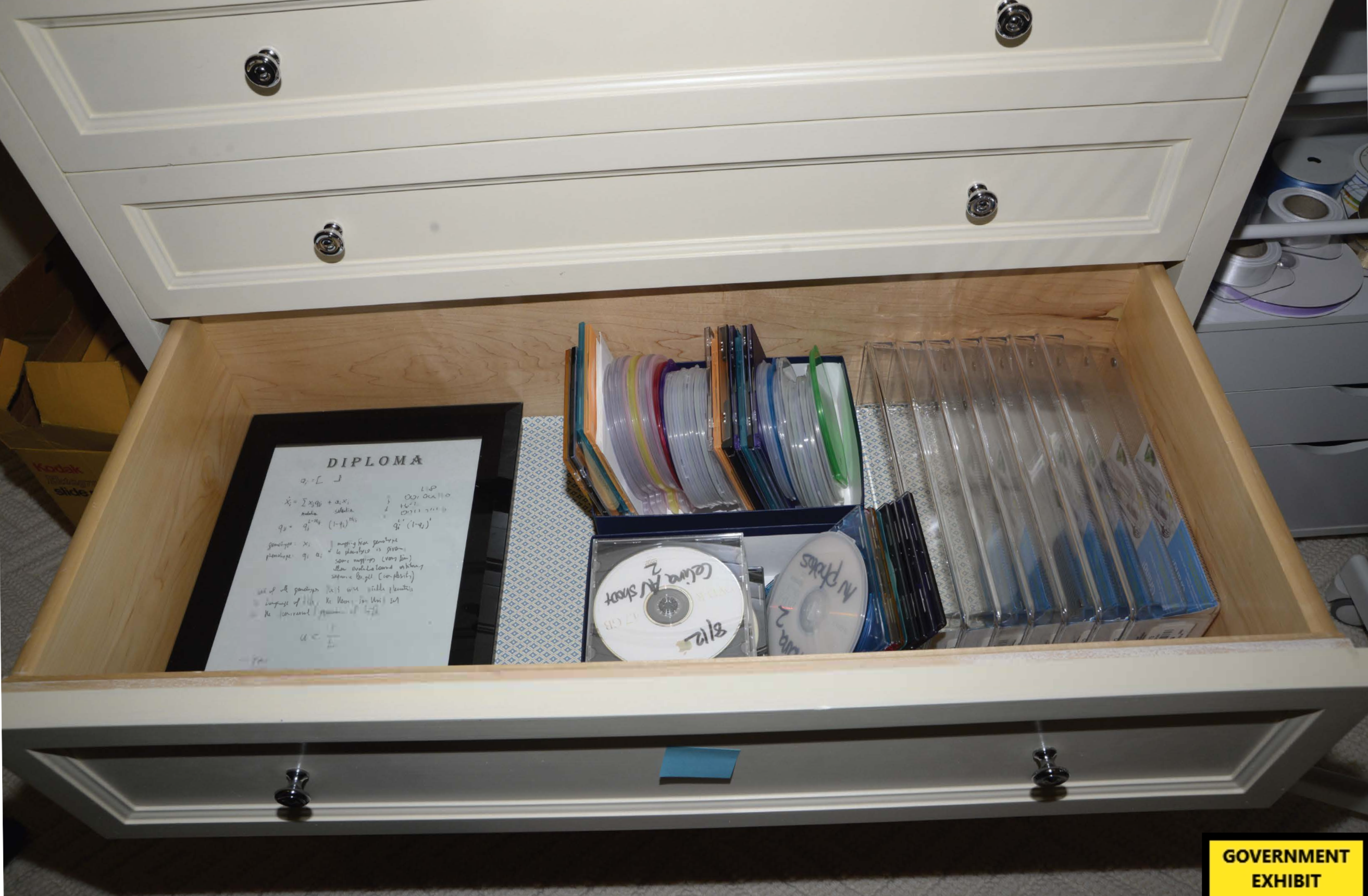 More hard drives and CDs found inside a shelf in a bedroom in Epstein’s home