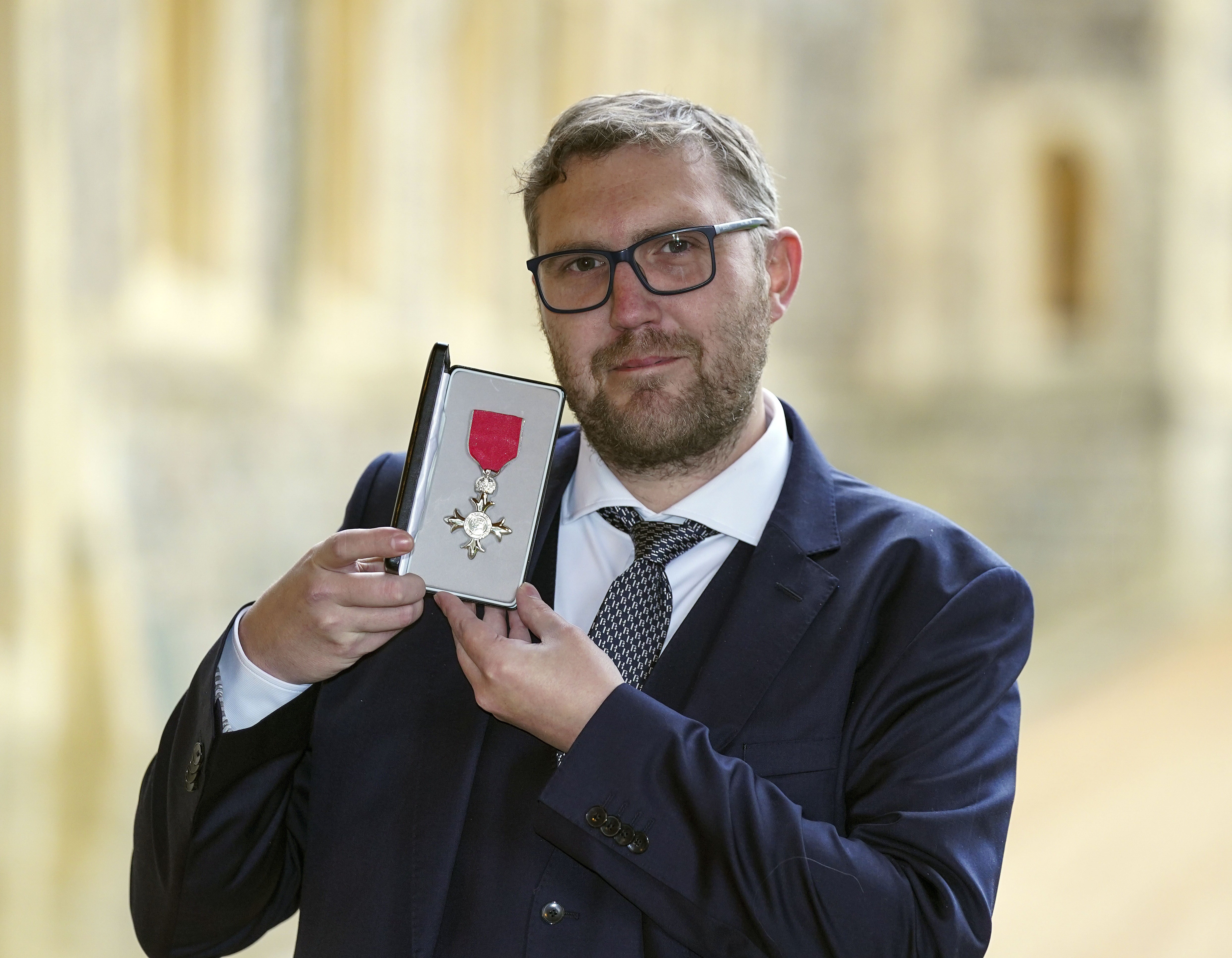 Jay Flynn is made an MBE (Member of the Order of the British Empire) by the Duke of Cambridge at Windsor Castle (Steve Parsons/PA)