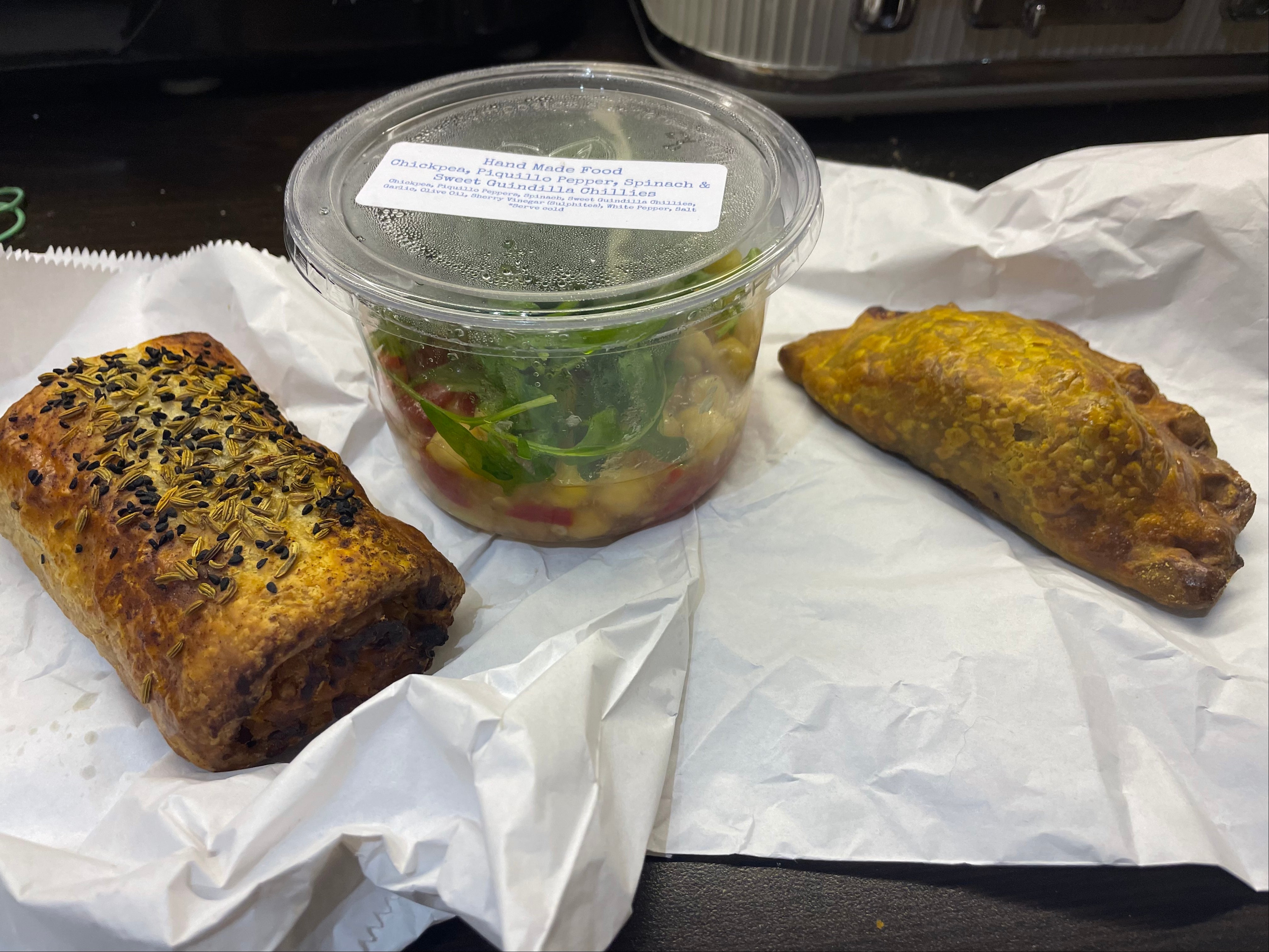 A vegetarian sausage roll, chickpea salad, and a pasty rescued for just £3.50 using Too Good To Go