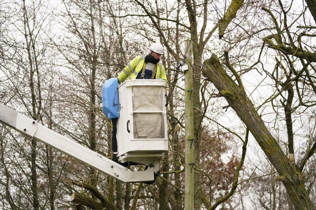 An Openreach engineer fixes telephone lines near Barnard Castle in County Durham in the aftermath of Storm Arwen as Storm Barra hit the UK and Ireland with disruptive winds, heavy rain and snow on Tuesday. Picture date: Tuesday December 7, 2021.