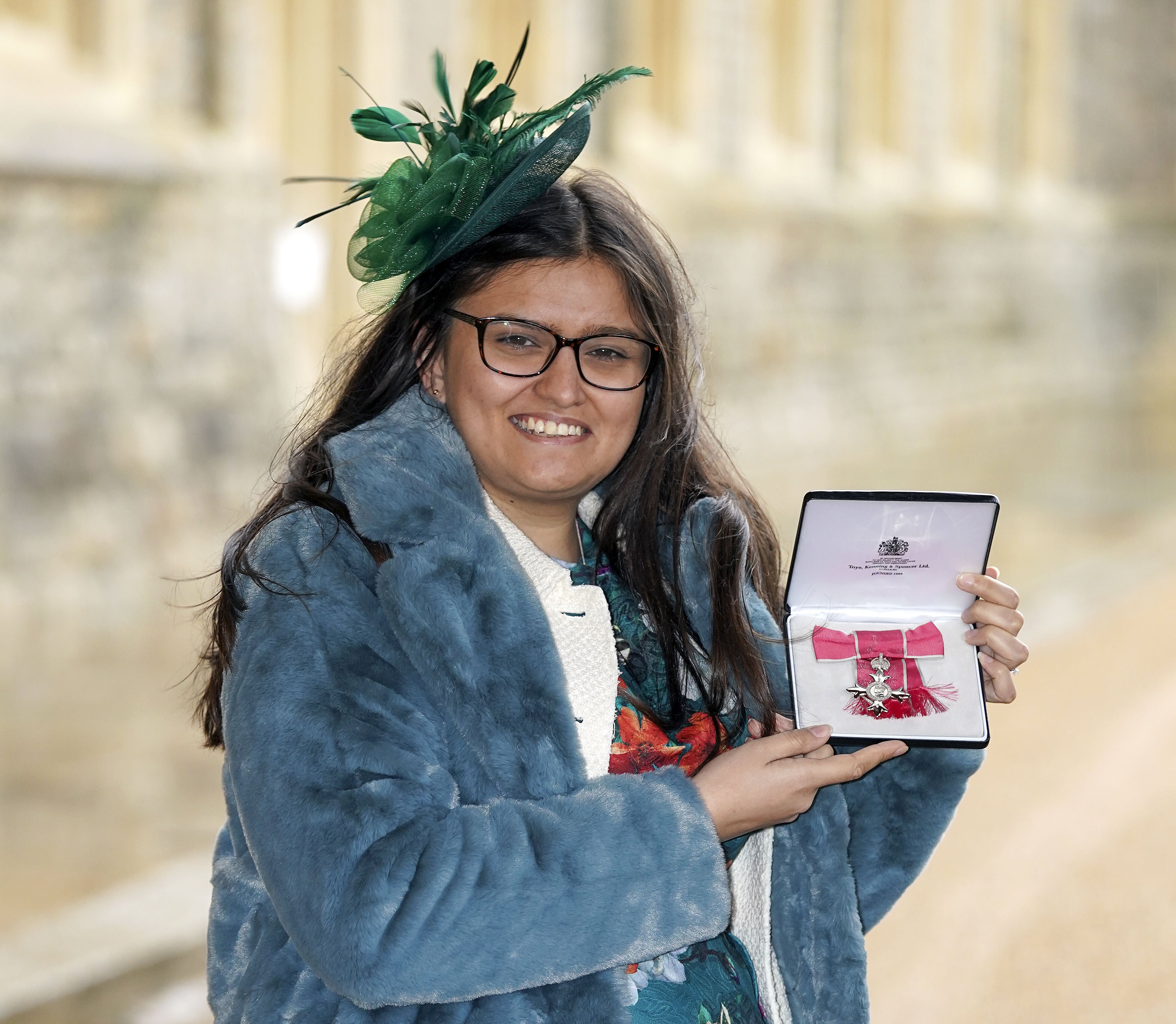 Amelia Collins-Patel from Thurnby with her award after she was made an MBE (Steve Parsons/PA)
