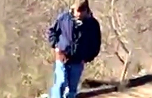 <p>This grainy image was taken on Libby’s phone on the trail the day the girls went missing. Investigators believe the man is the killer</p>