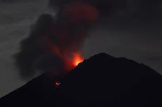 Rain, lava from Indonesian volcano hamper search for missing