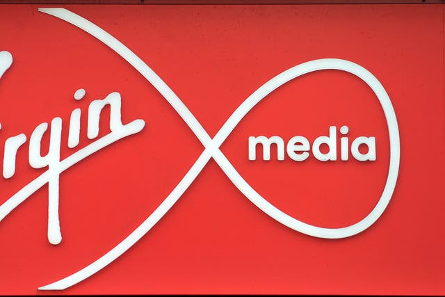 A shop sign for Virgin media in central London (PA)