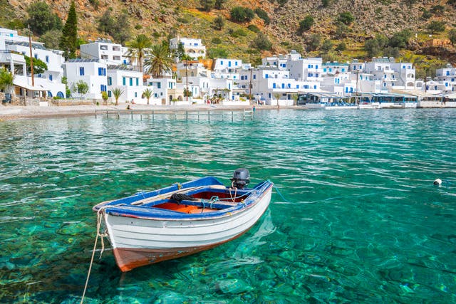 <p>Holidaymakers were dreaming of idyllic Greek breaks such as Loutro in Crete</p>
