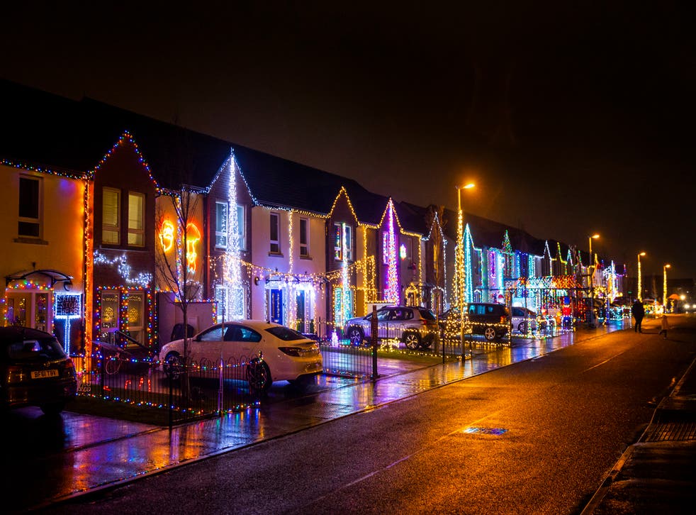 Residents of Racecourse Drive in Derry turn the street into Christmas Drive to raise funds for local charities (Liam McBurney/PA)