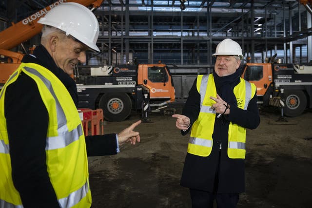 Director General of the BBC Tim Davie and Culture Secretary Angus Robertson visited the site of the new studio (Jane Barlow/PA)