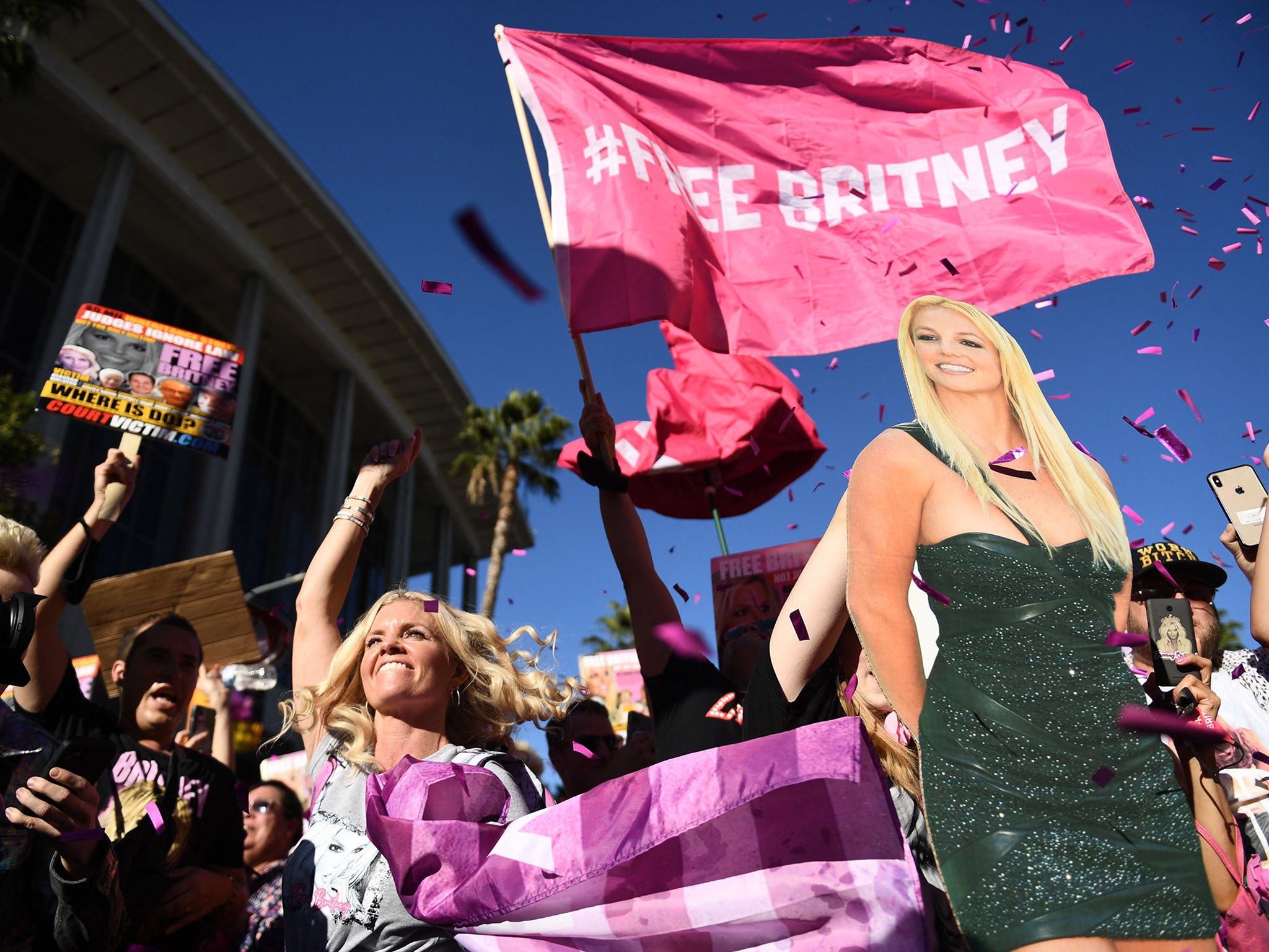 Supporters of the #FreeBritney movement gather outside her Los Angeles conservatorship hearing in November 2021