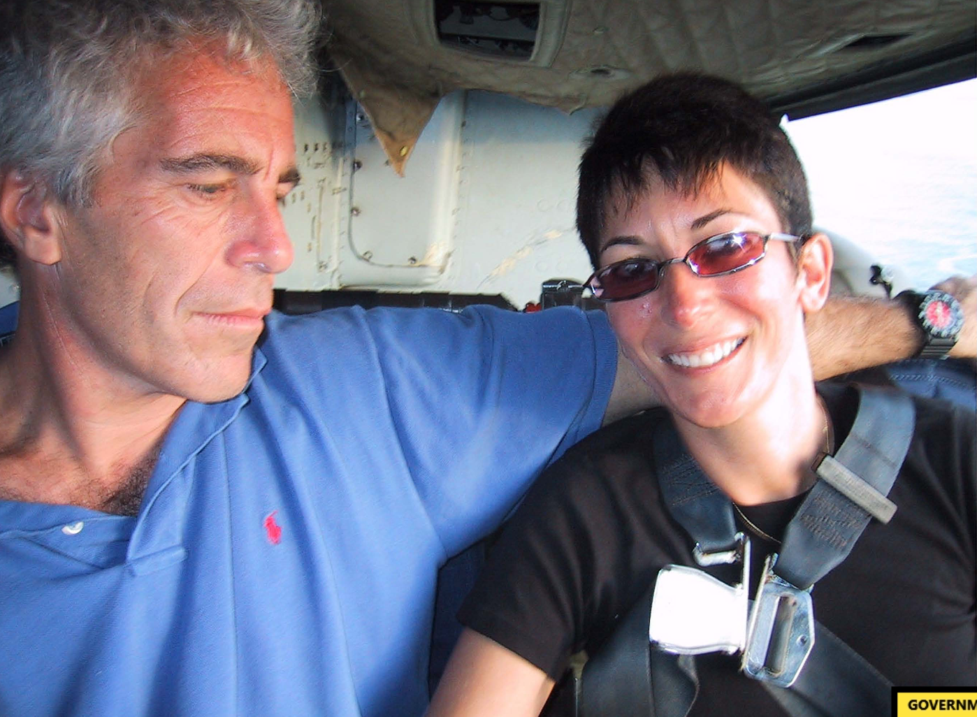 An undated photo of Epstein with Maxwell on a plane