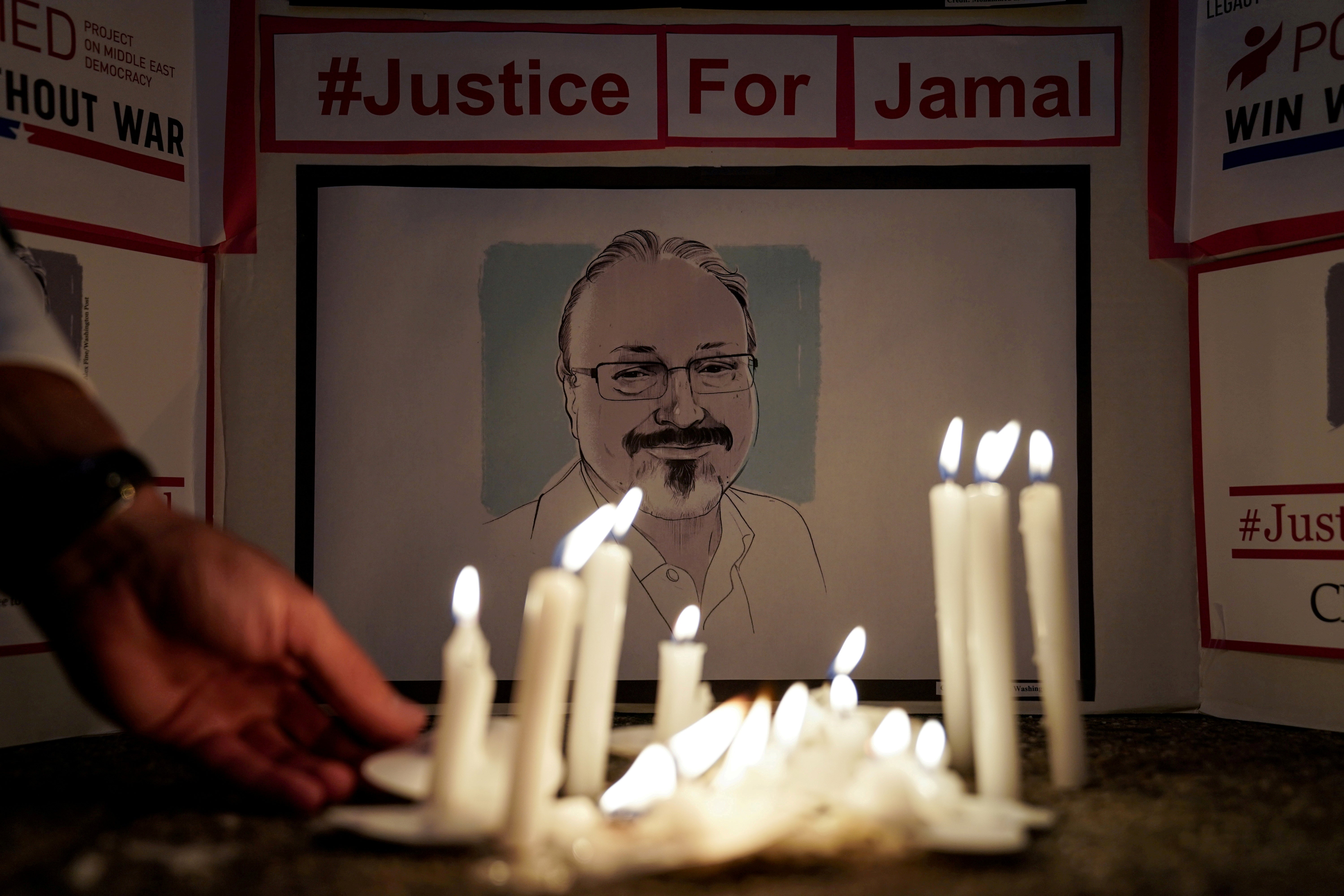 A candlelight vigil in front of the Saudi Embassy in Washington remembers Khashoggi