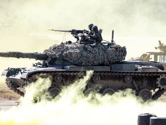 <p>Battle ready: Taiwan soldiers drive a CM-11 Brave Tiger battle tank during a military exercise in Taiwan </p>