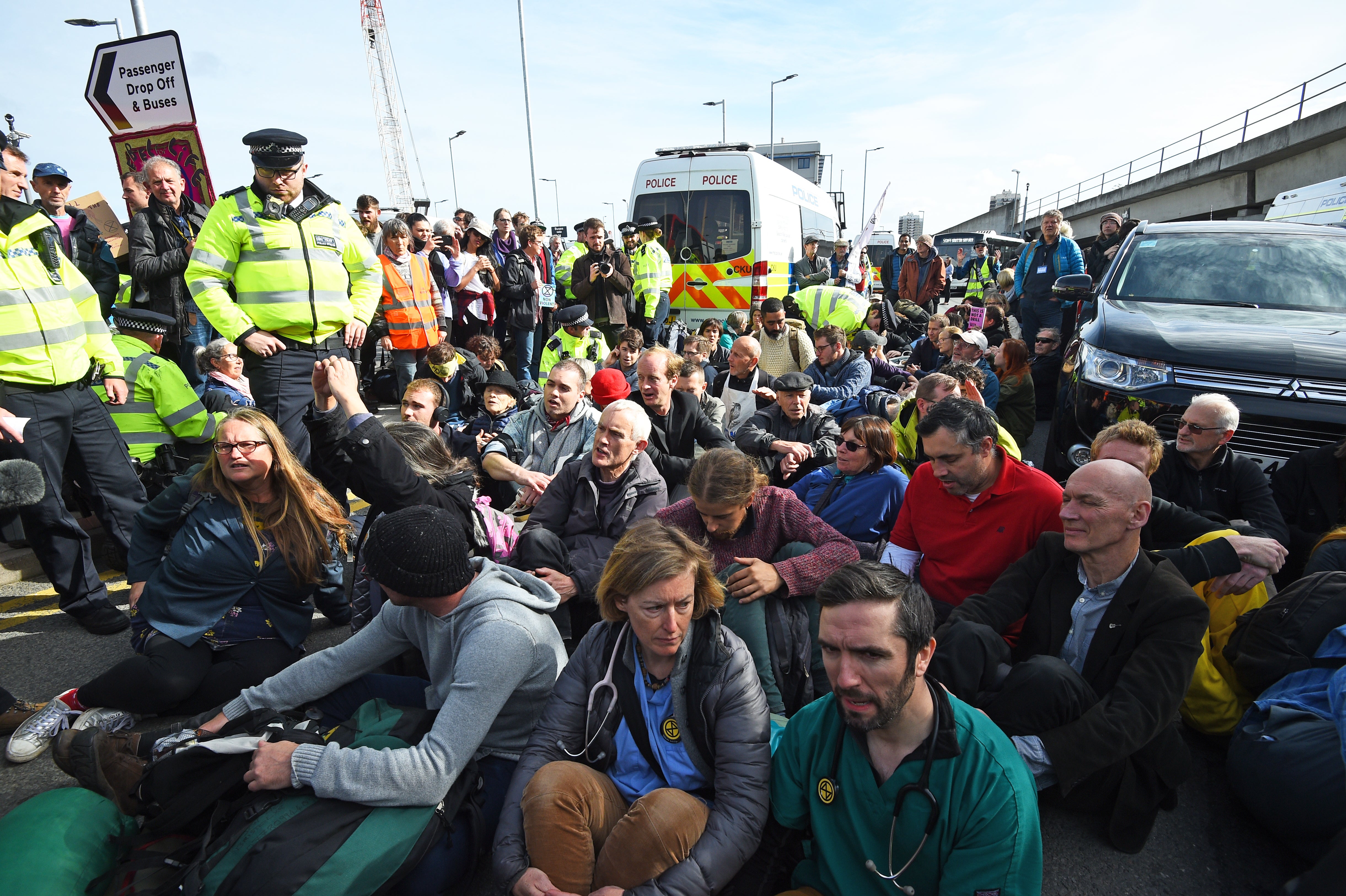 Protesters blocking the road outside City Airport during an Extinction Rebellion climate change protest (Kirsty O’Connor/PA)