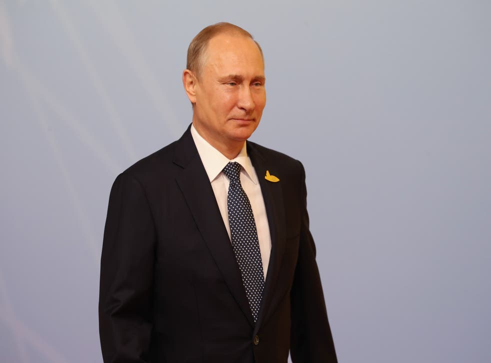 Vladimir Putin said Russia’s troops are not being threatening (Matt Cardy/PA)