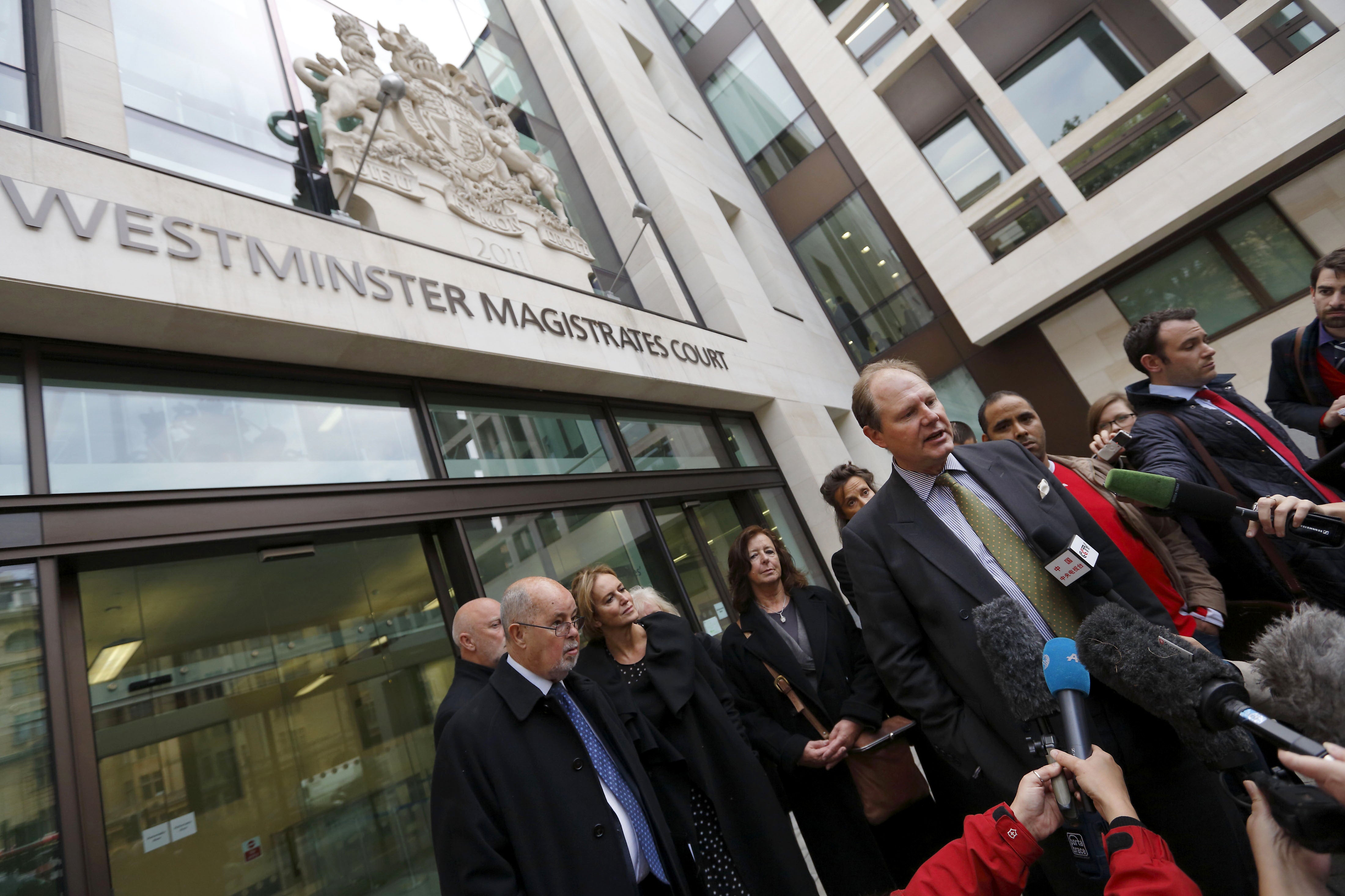 Smith speaks to journalists outside Westminister Magistrates Court in London in 2012