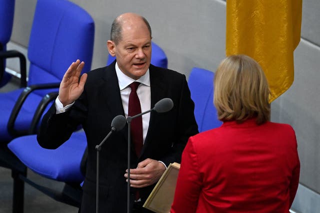 <p>German chancellor Olaf Scholz takes the oath from president of the Bundestag</p>