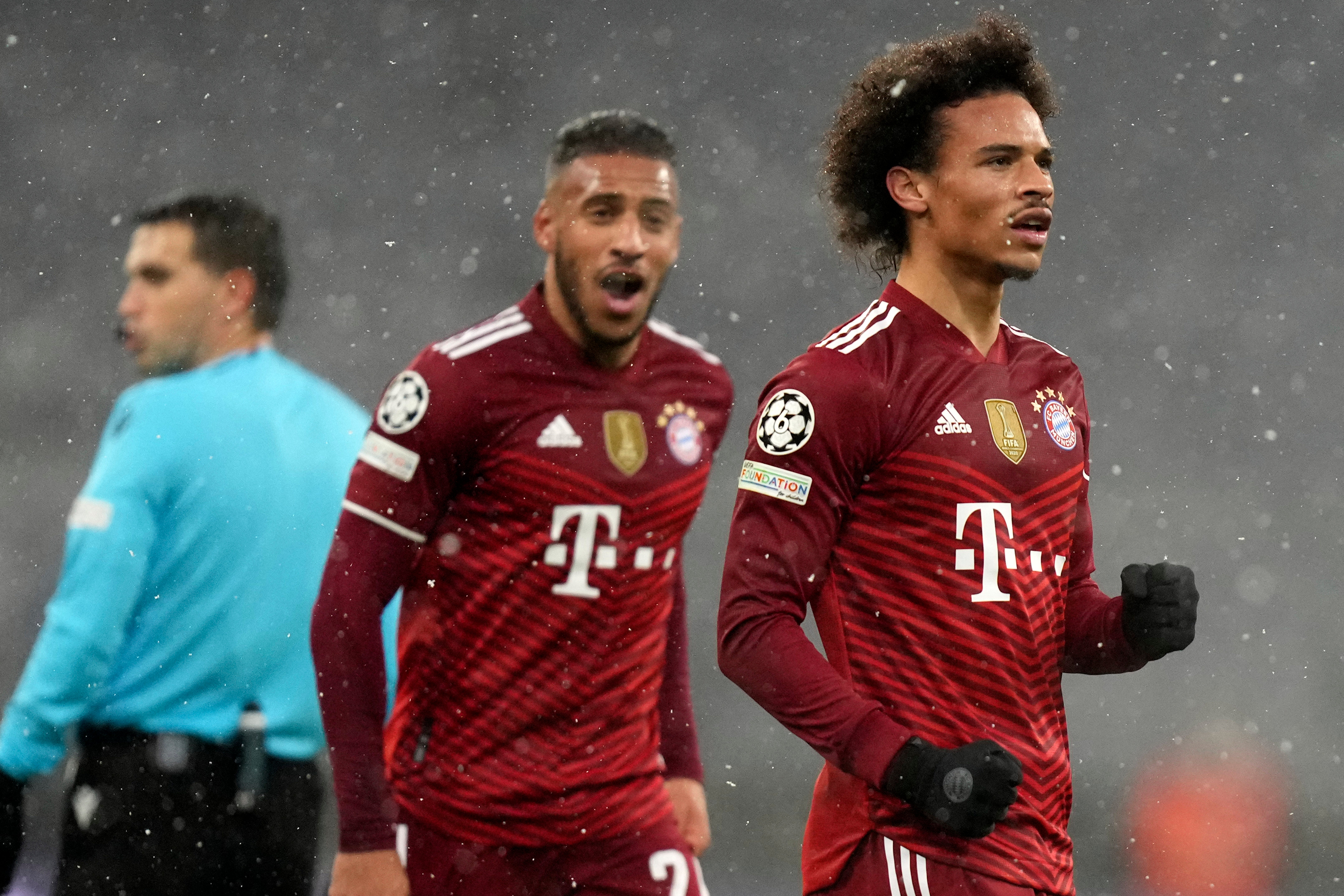 Leroy Sane (right) celebrates scoring Bayern Munich’s second goal in their 3-0 victory over Barcelona (Matthias Schrader/AP)