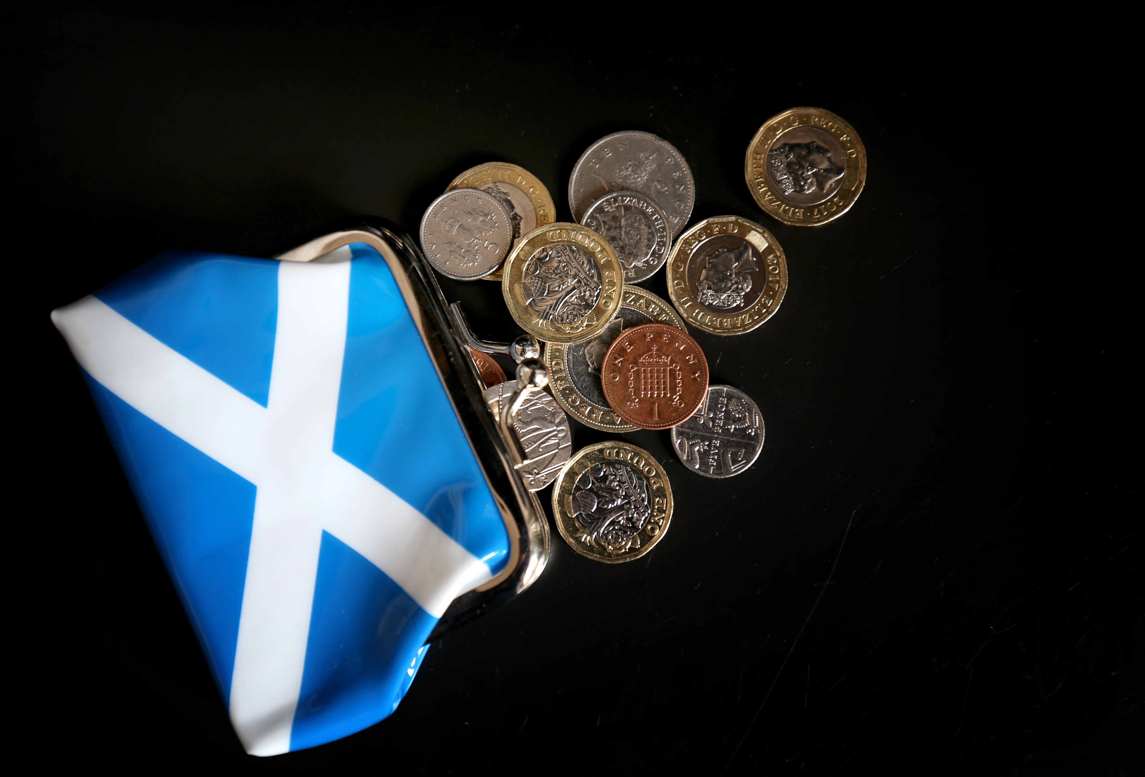The Scottish Conservatives called for councils to get more cash, and for a 75% rates rebates for businesses in those sectors worst hit by Covid. (Jane Barlow/PA)