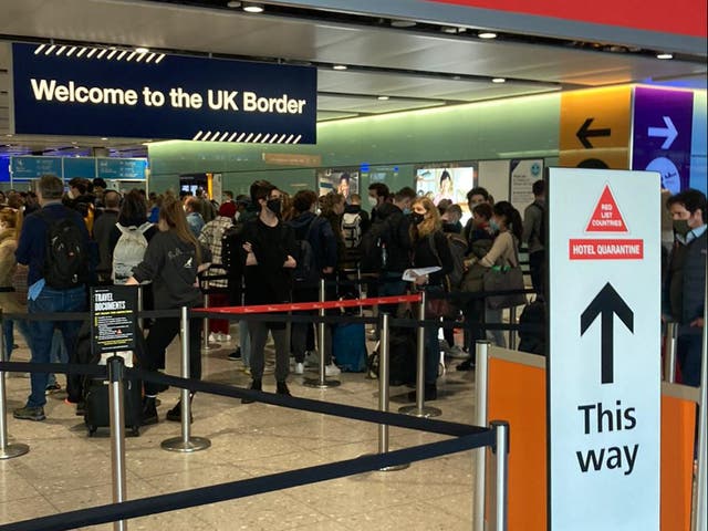 <p>Red alert: the queue for hotel quarantine at London Heathrow Airport</p>
