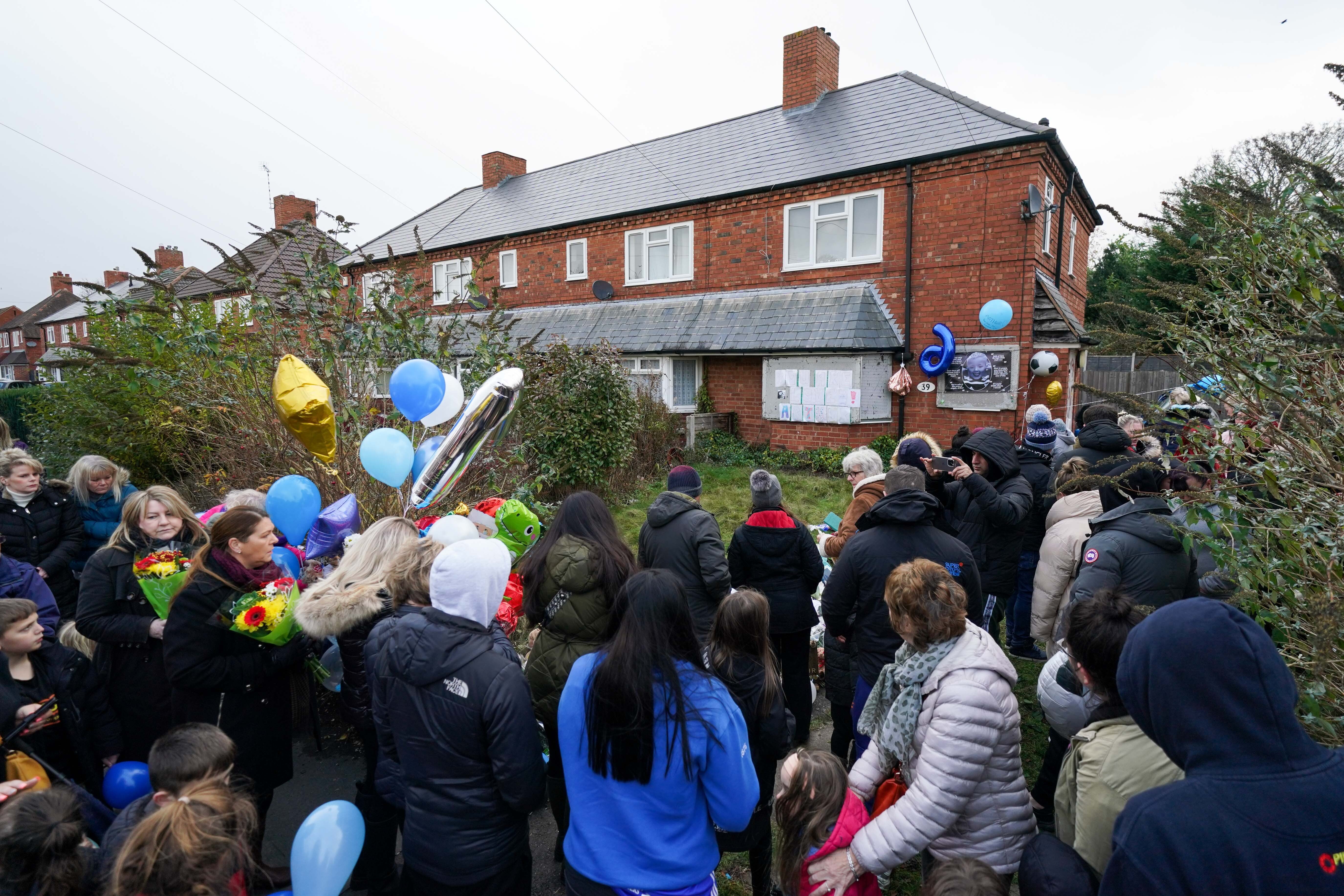 There has been an outpouring of public grief about the abuse and murder of Arthur Labinjo-Hughes, including a recent vigil outside the home where he was killed (Jacob King/PA)