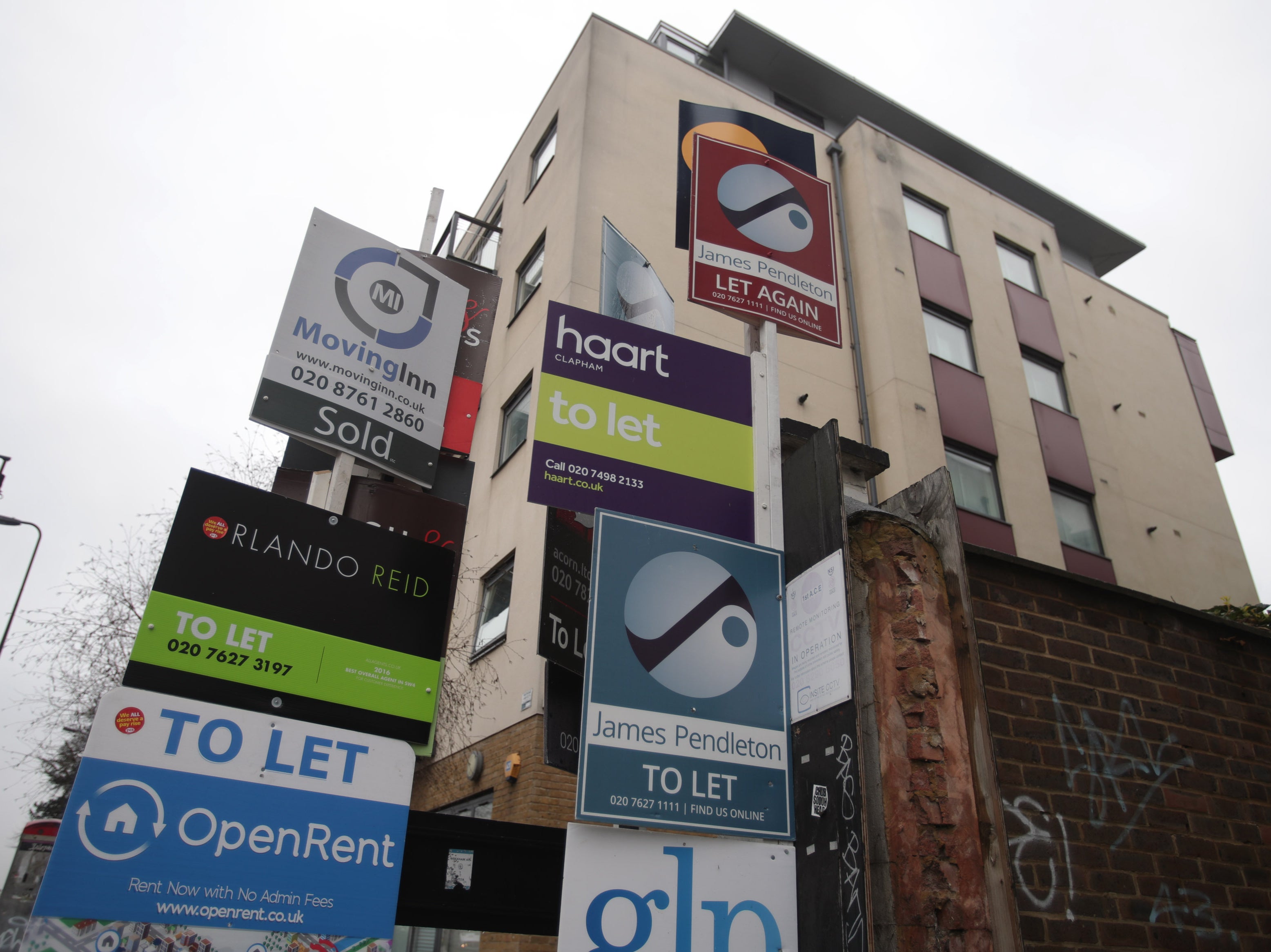 ‘Let by’ signs at flats in Clapham, south-west London