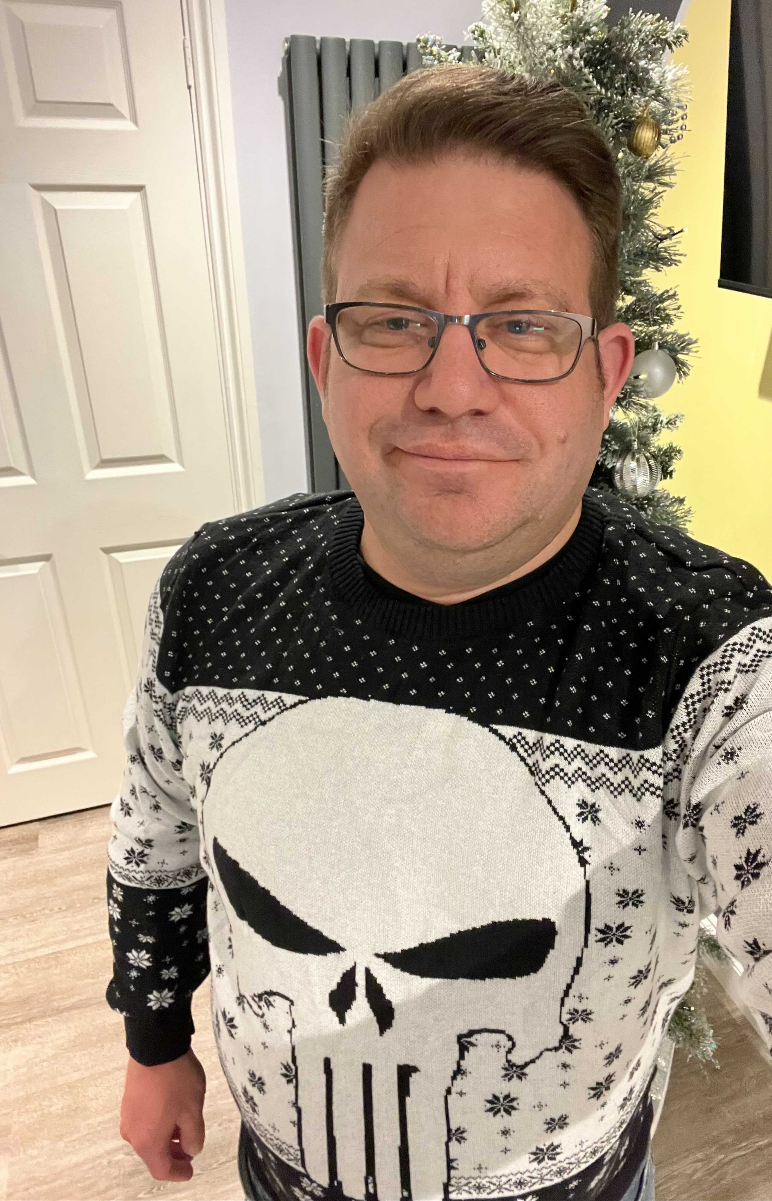 Graham Smith wearing his favourite Christmas jumper