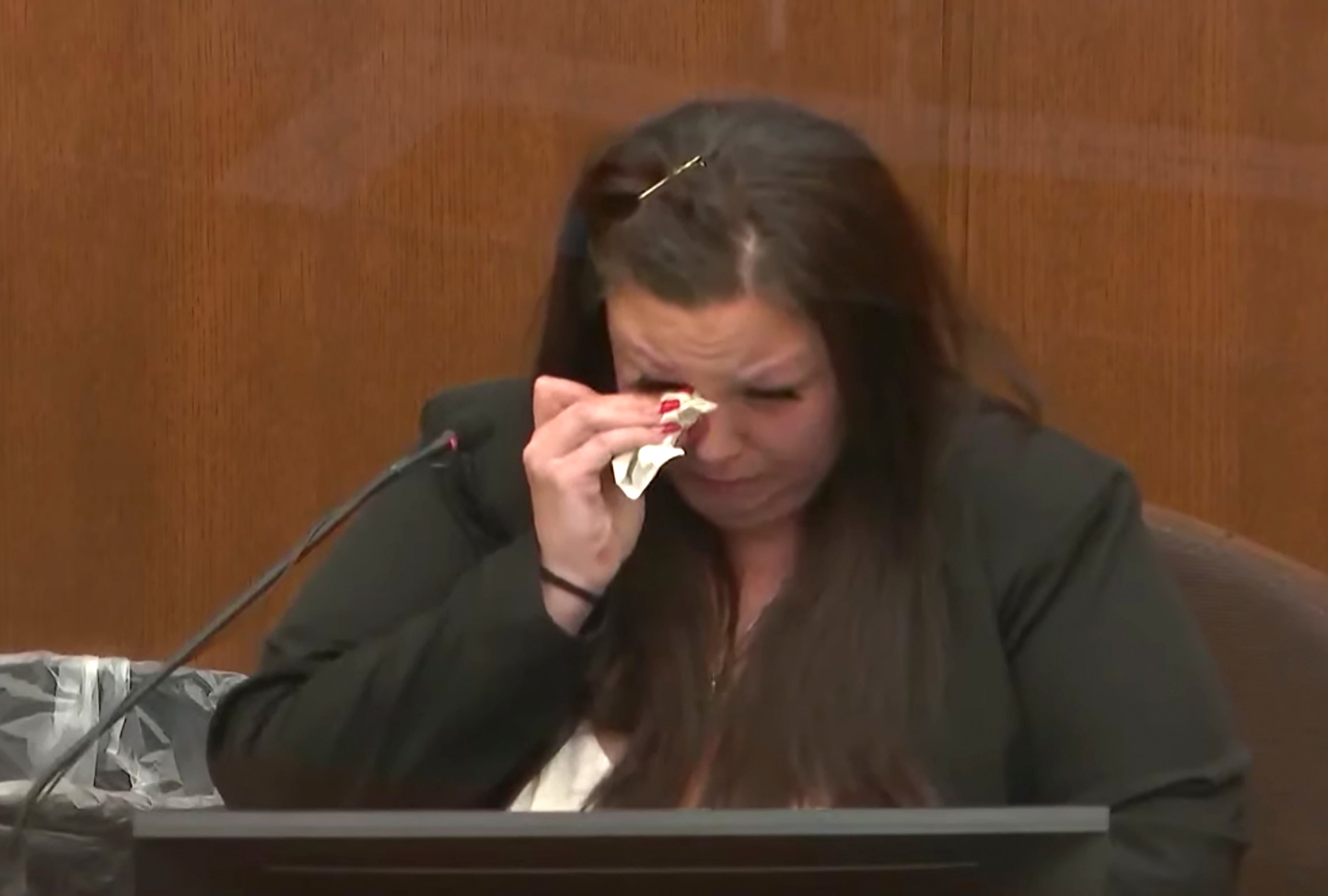 Daunte Wright’s mother Katie Bryant sobs on the stand on Wednesday as she describes seeing her son’s lifeless body via video call